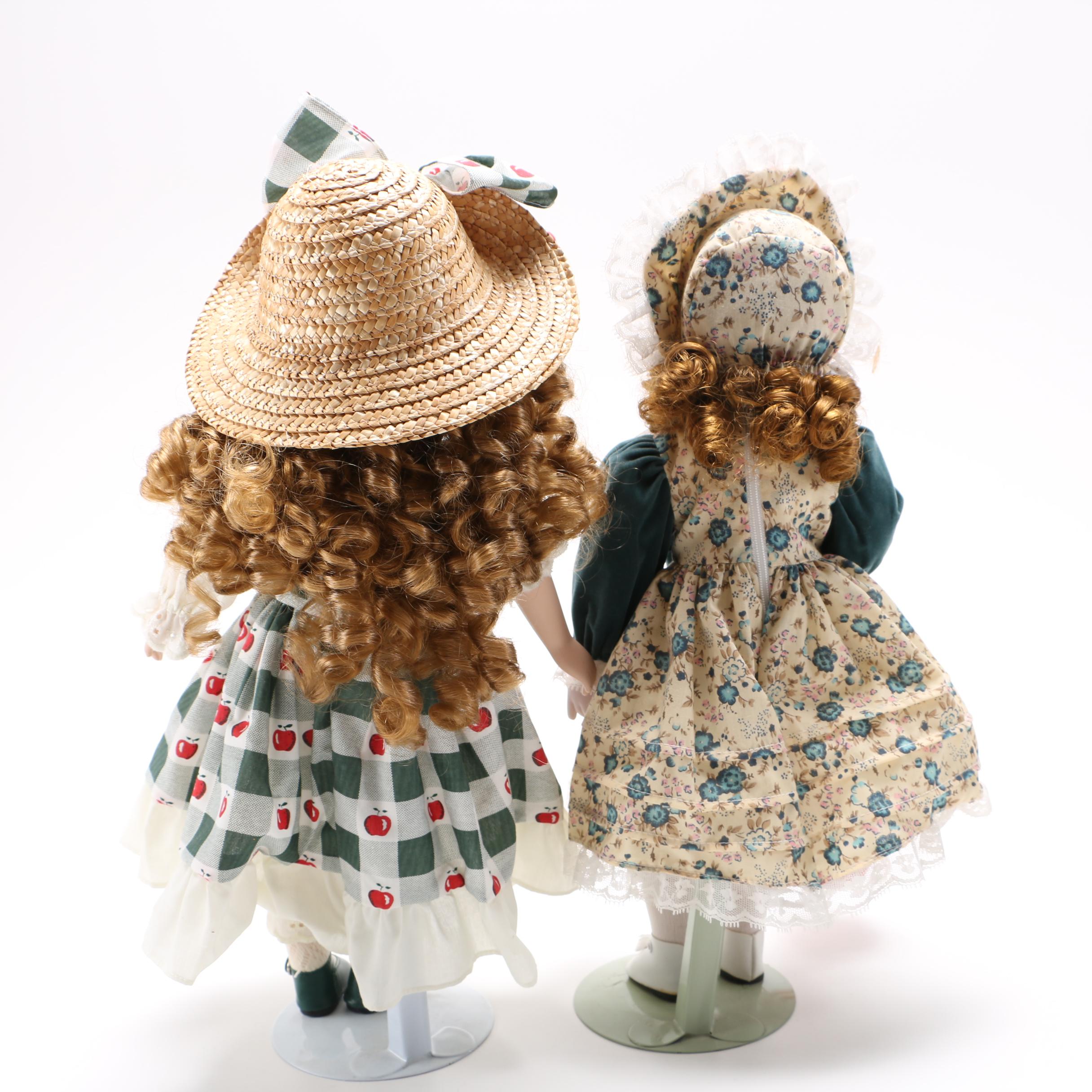 Two Porcelain Collector Dolls