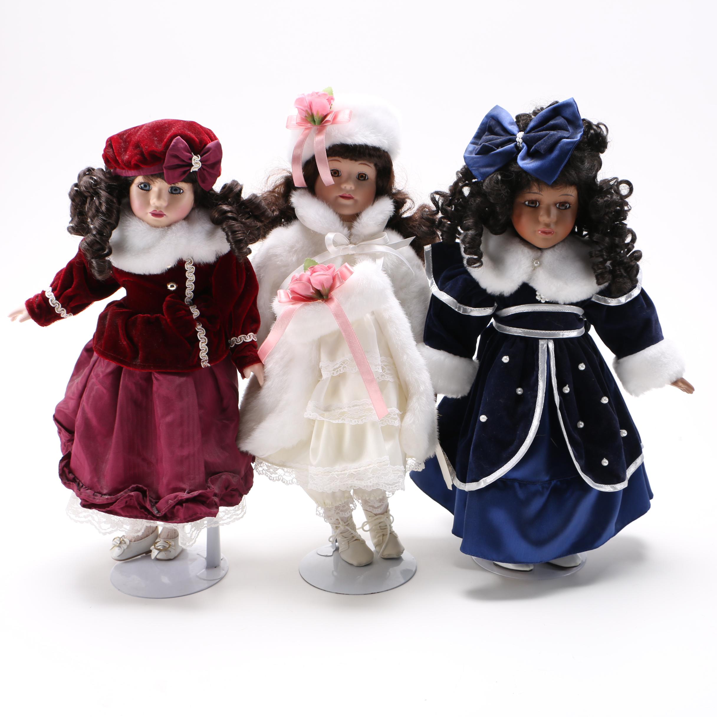 Collectible Porcelain Dolls in Winter Outfits
