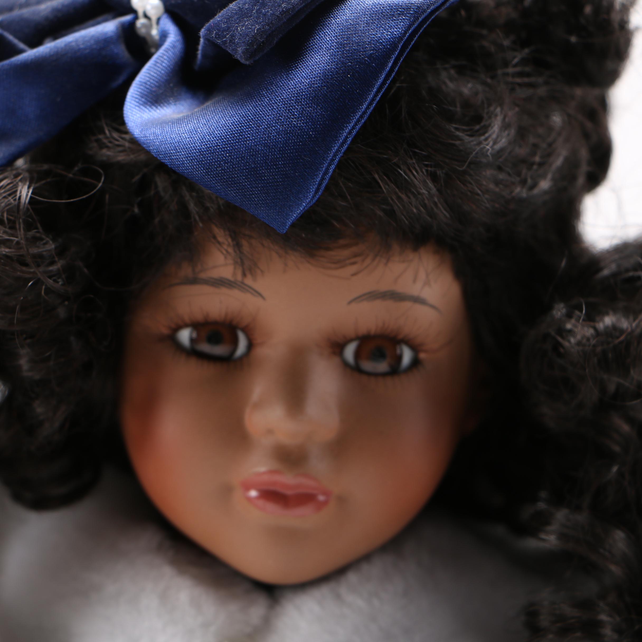 Collectible Porcelain Dolls in Winter Outfits