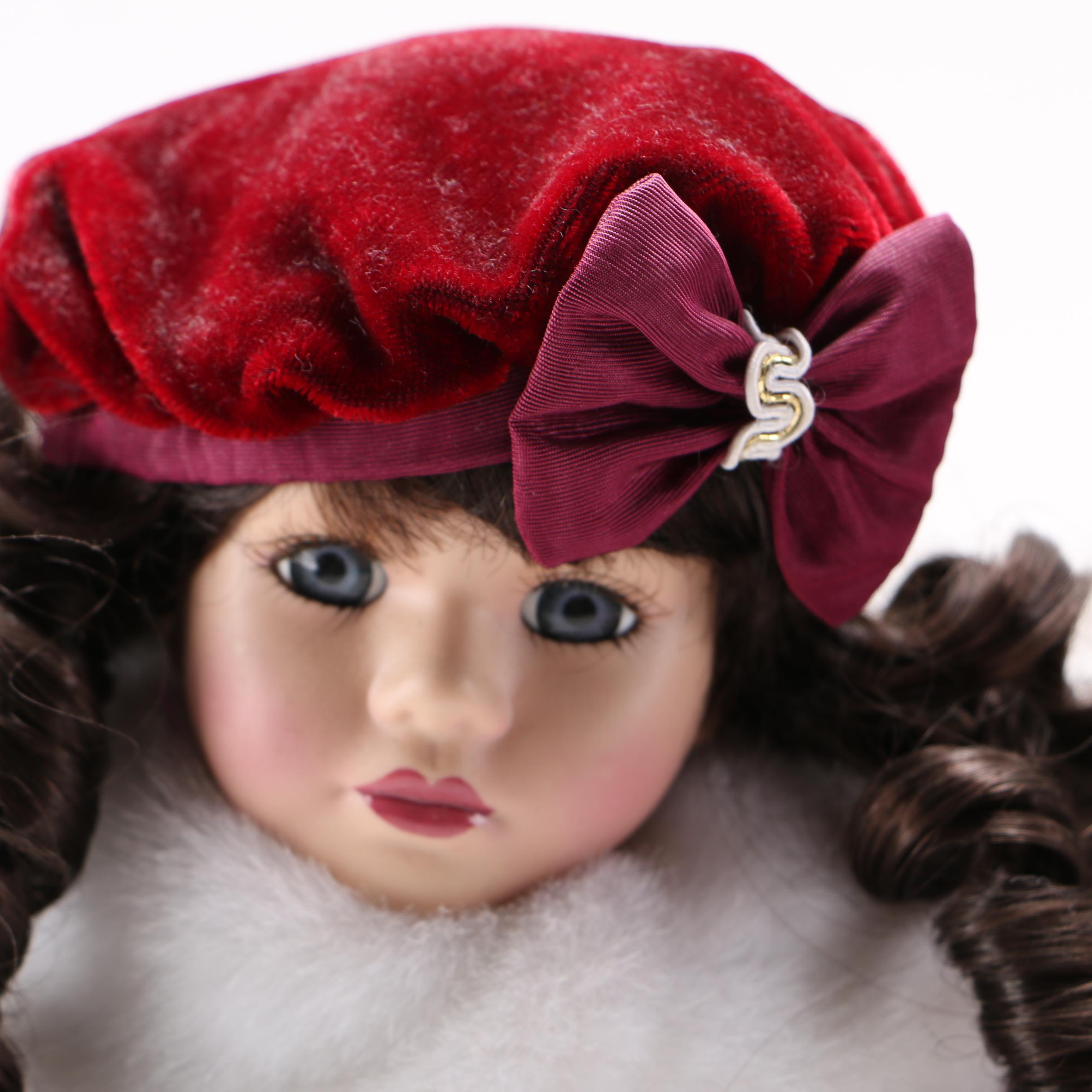 Collectible Porcelain Dolls in Winter Outfits