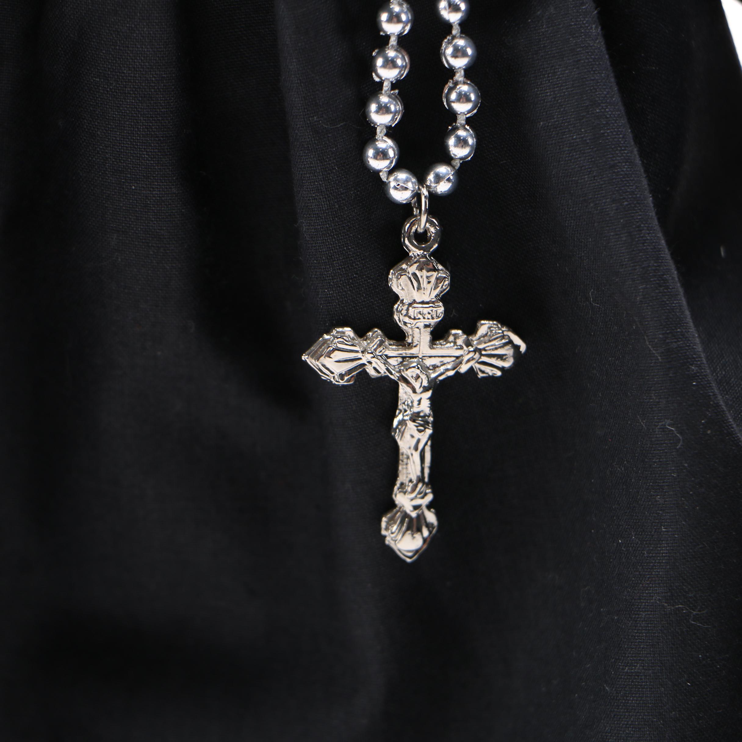 Nun and Amish Porcelain Dolls