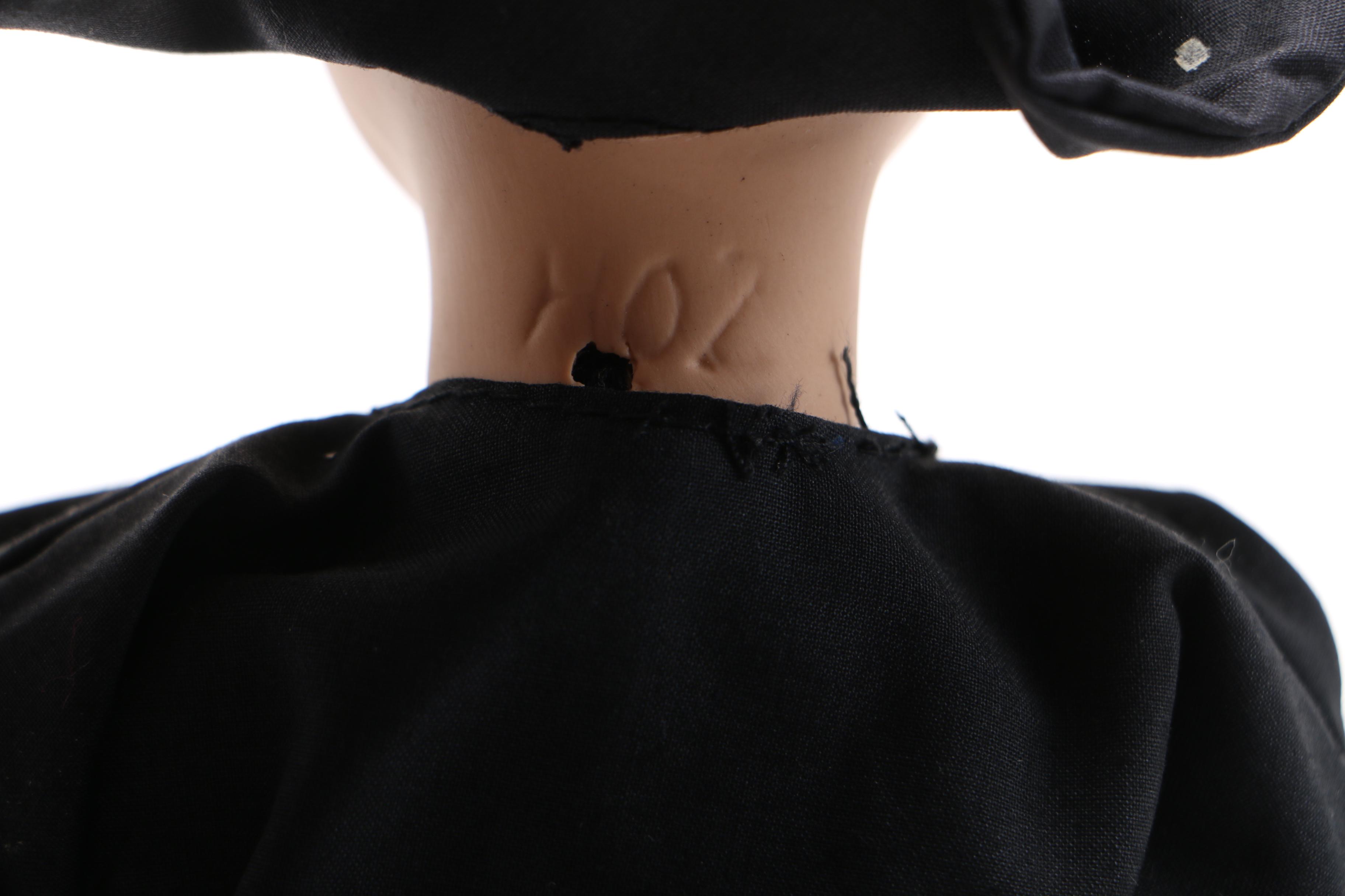 Nun and Amish Porcelain Dolls