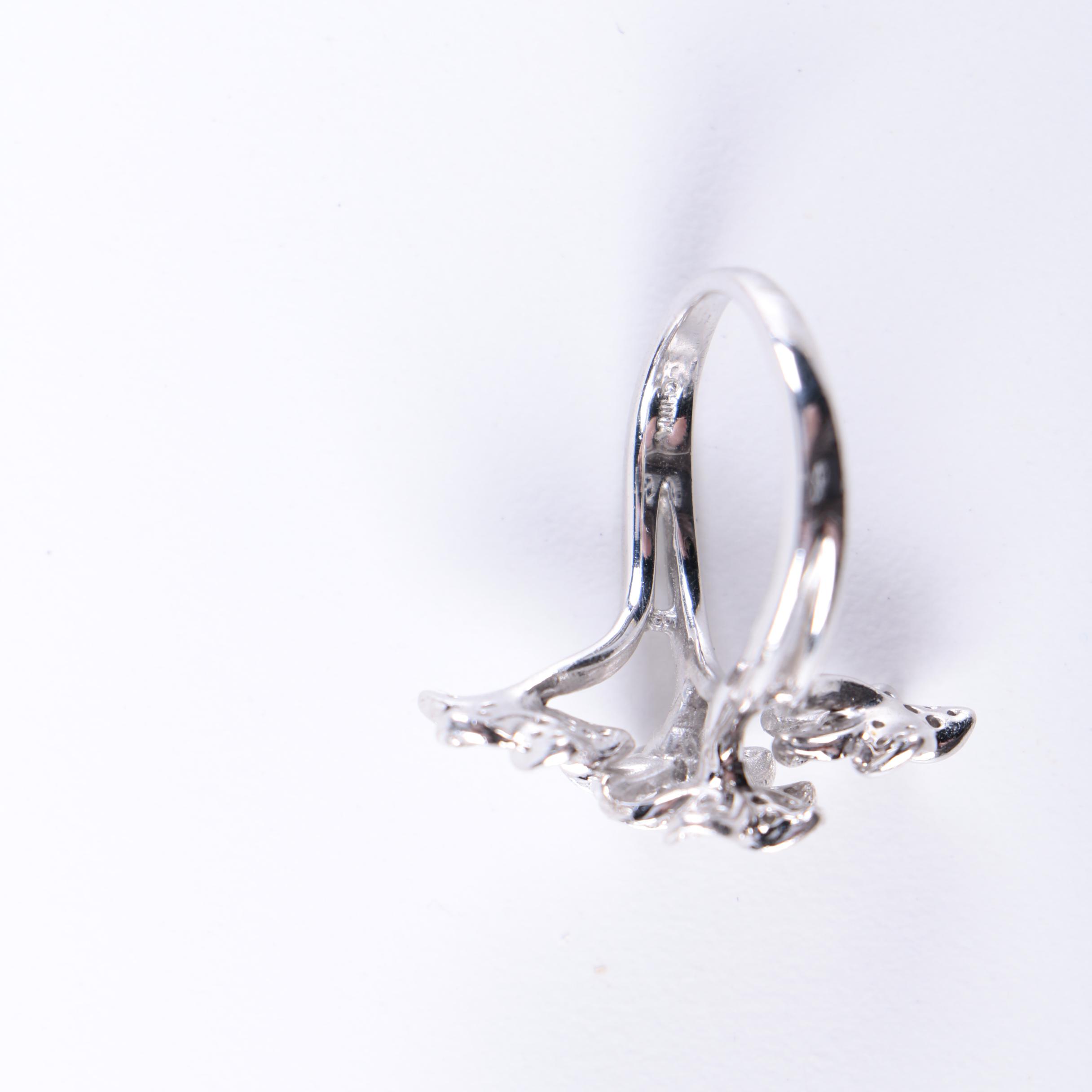 Sterling Silver Jewelry Including an Amethyst Pendant