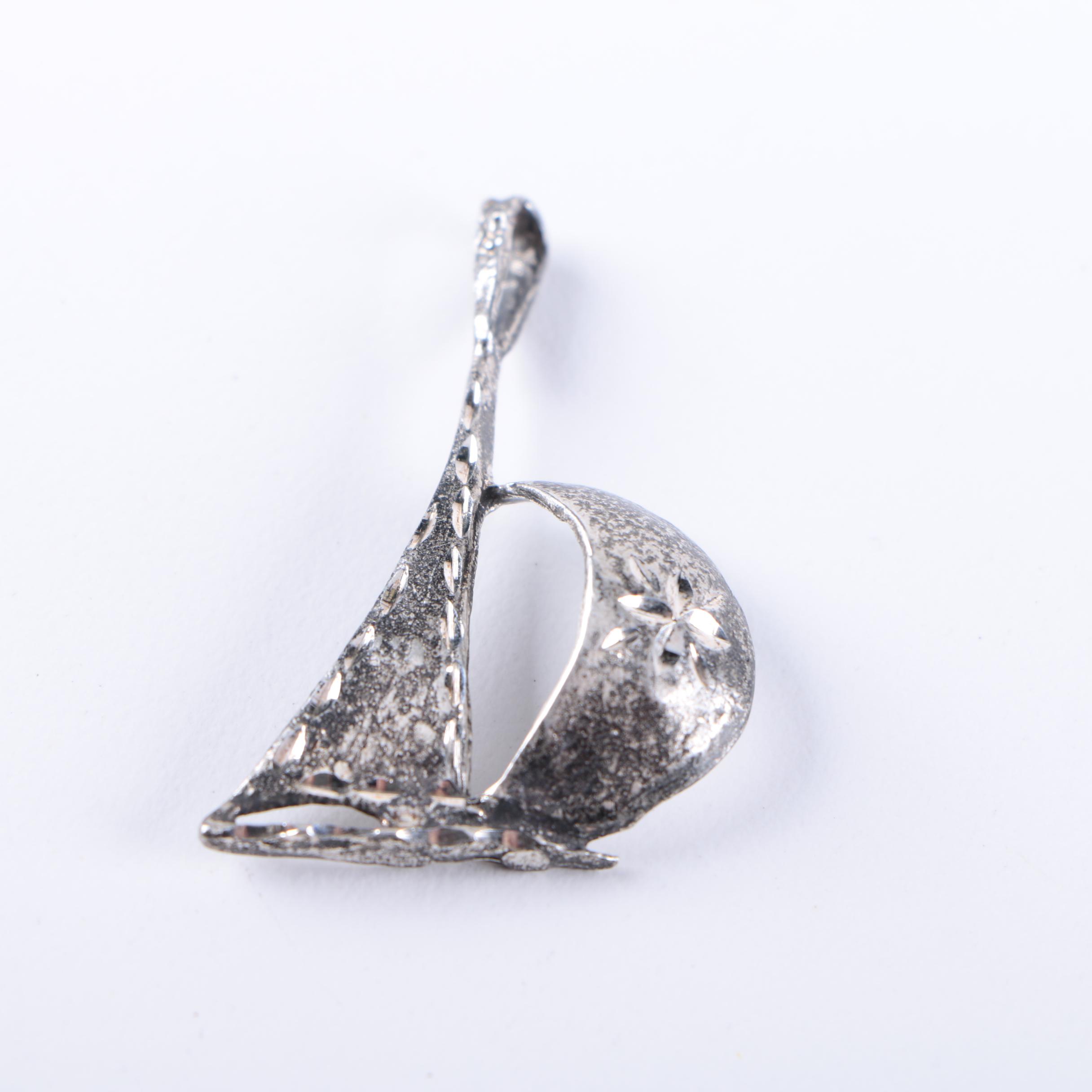 Sterling Silver Jewelry Including an Amethyst Pendant