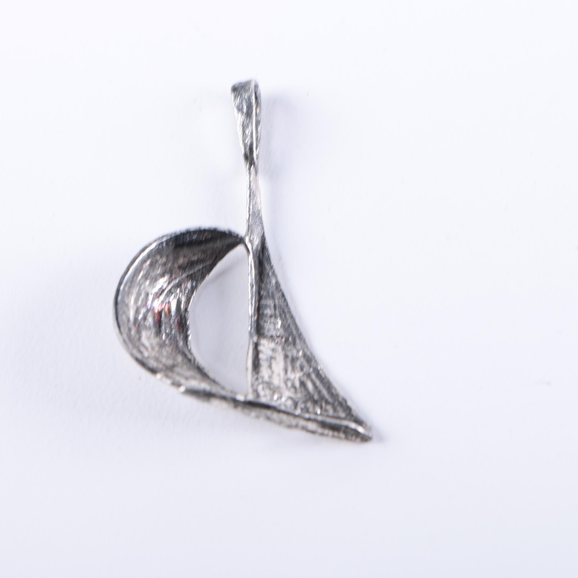 Sterling Silver Jewelry Including an Amethyst Pendant