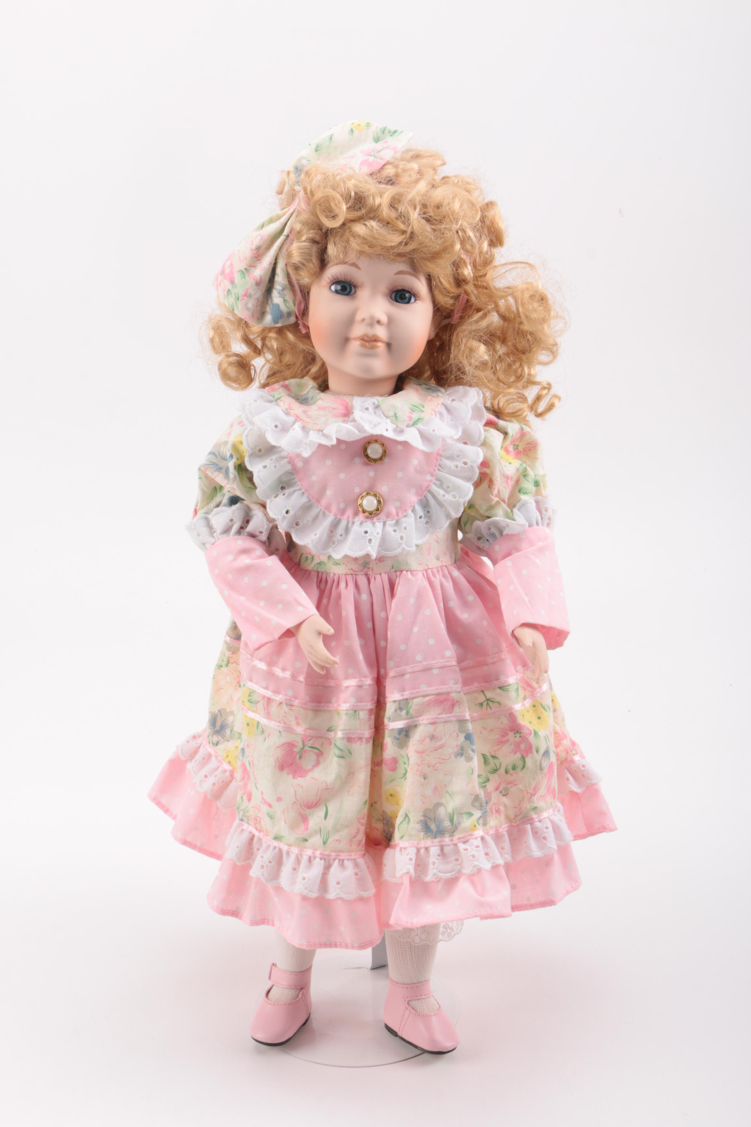 Pair of Porcelain Dolls