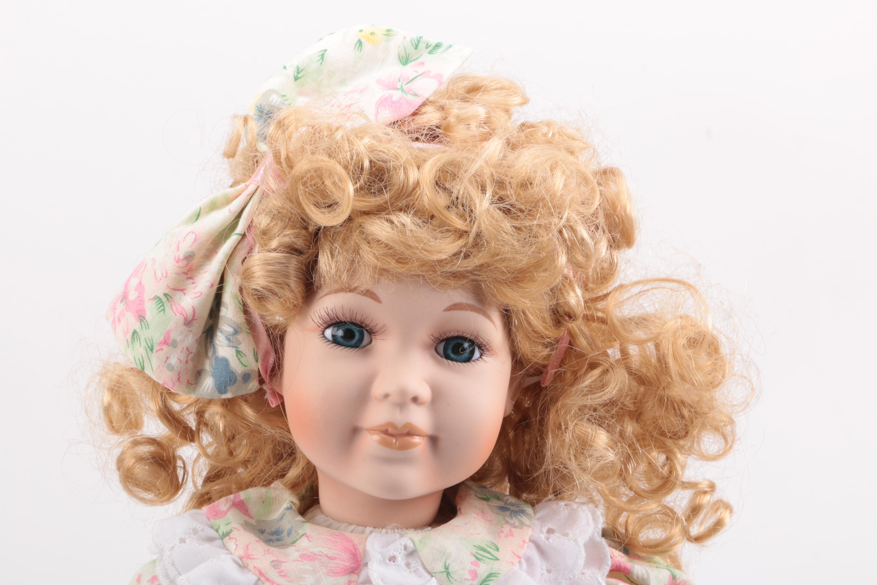 Pair of Porcelain Dolls