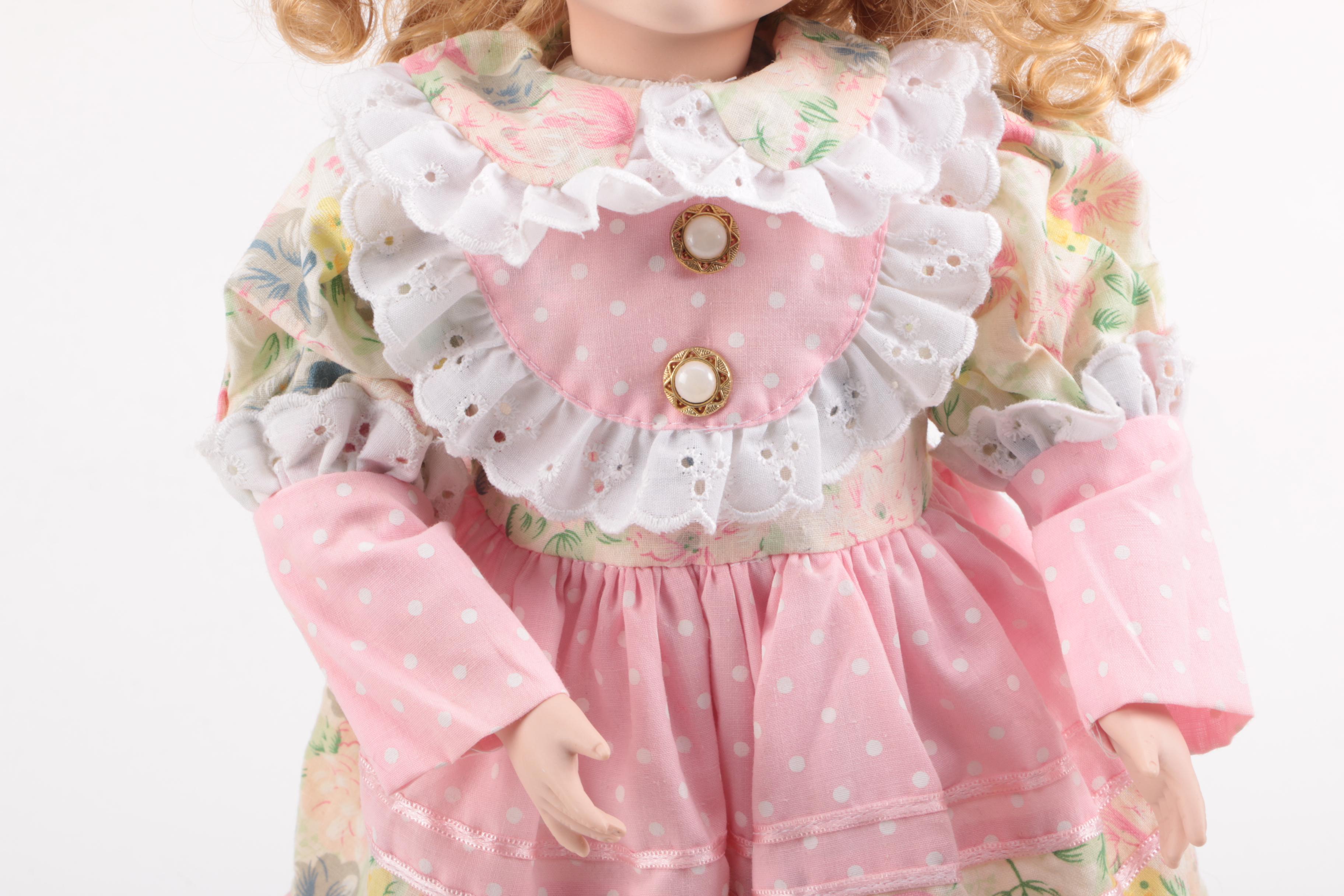 Pair of Porcelain Dolls