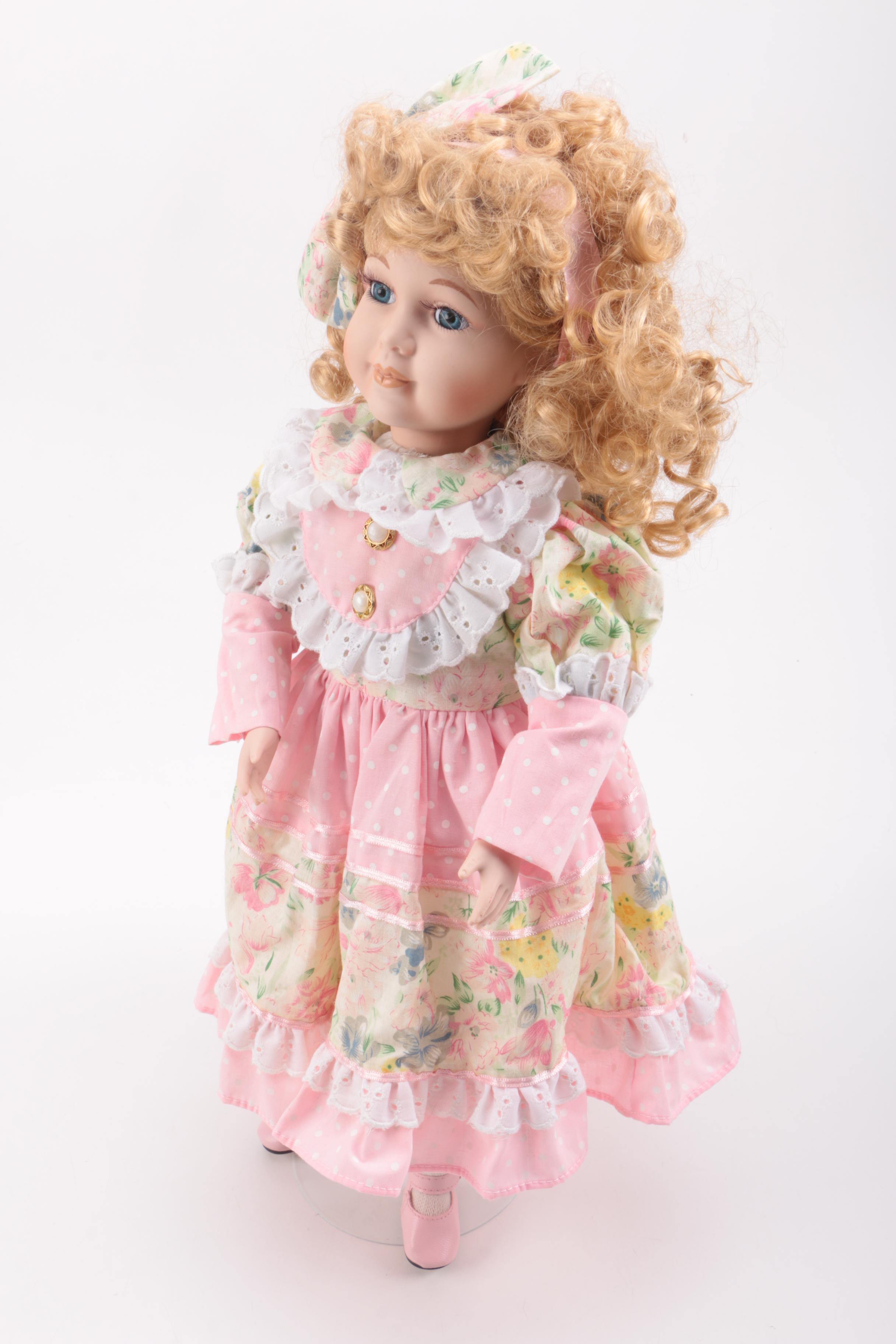 Pair of Porcelain Dolls