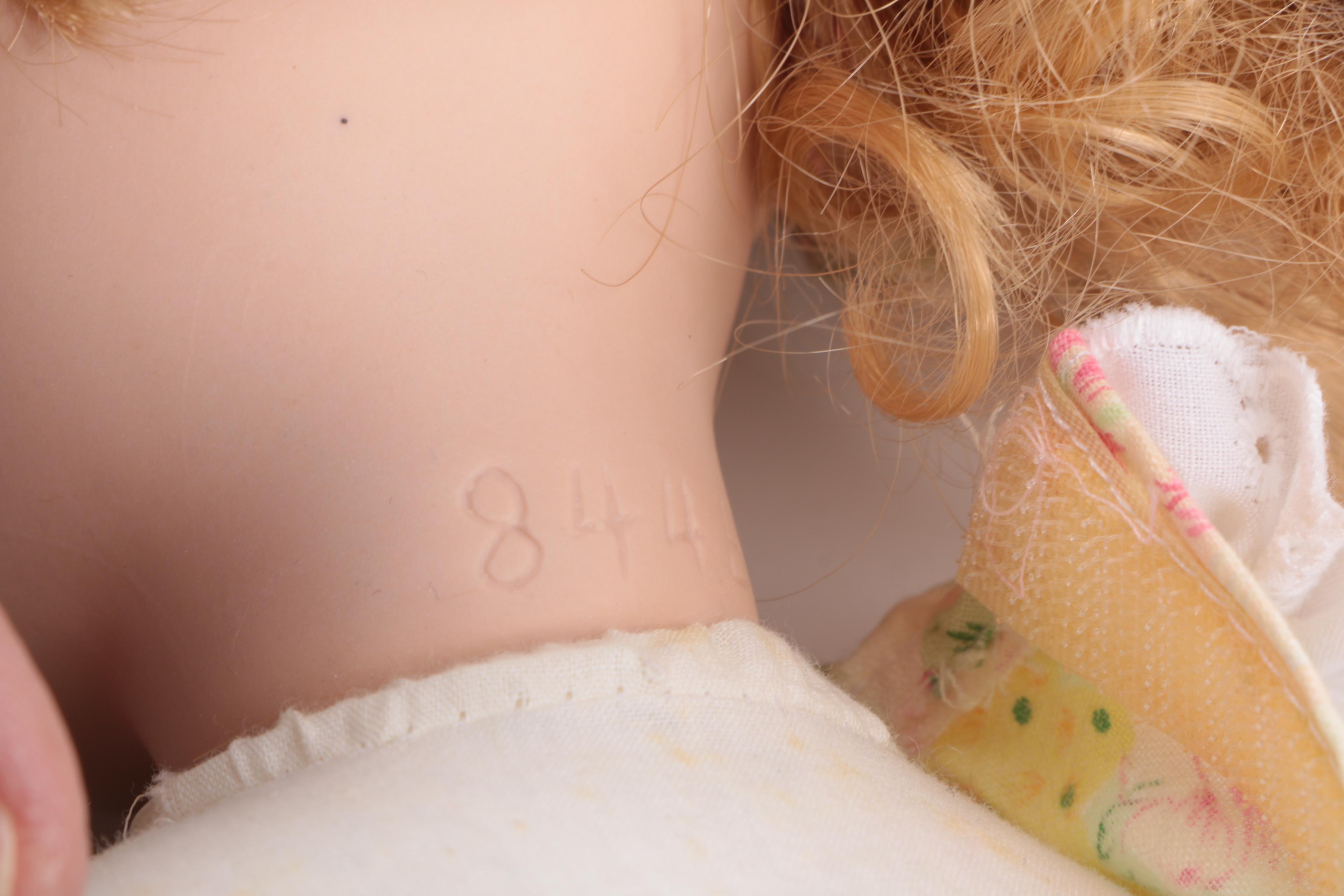 Pair of Porcelain Dolls