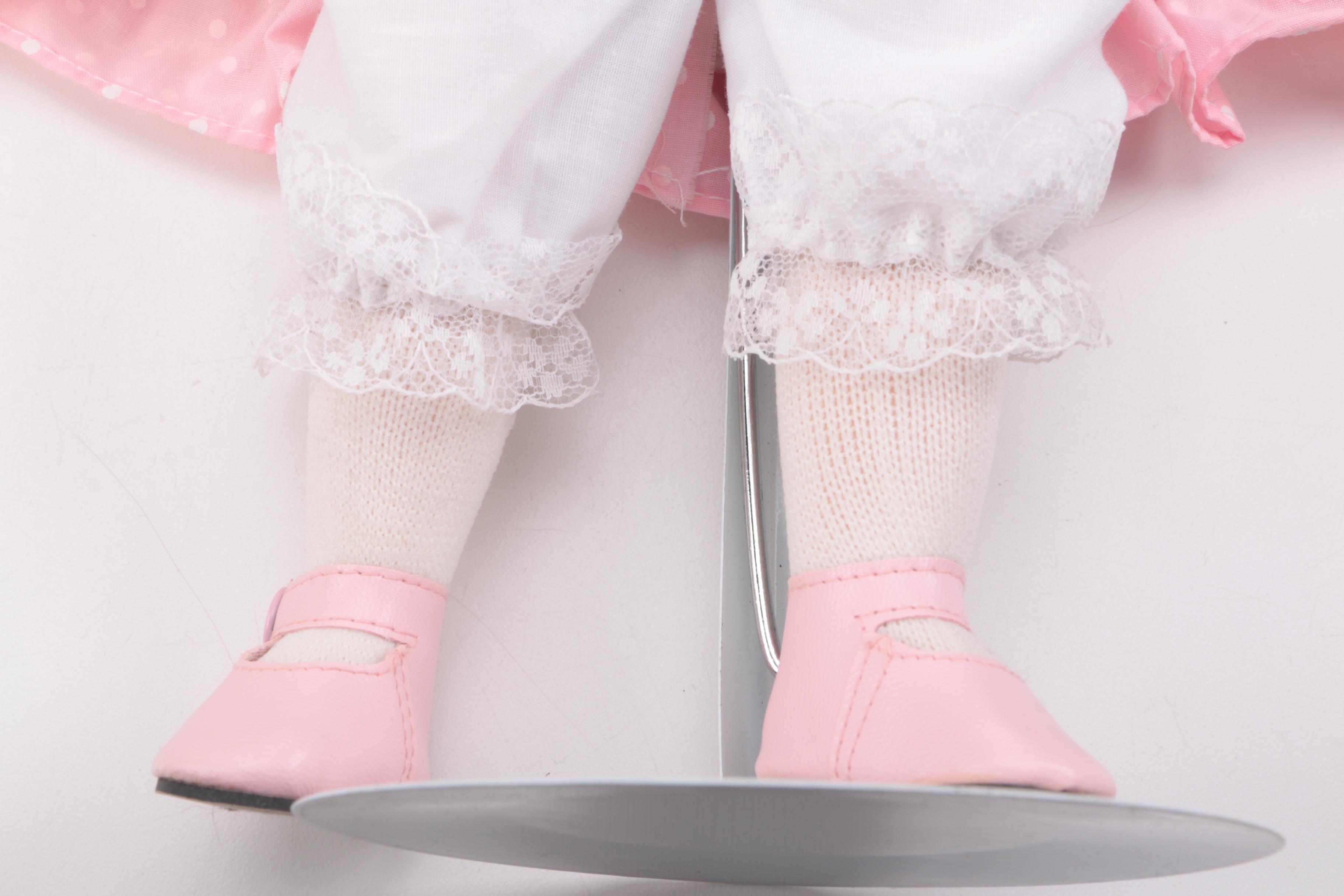 Pair of Porcelain Dolls