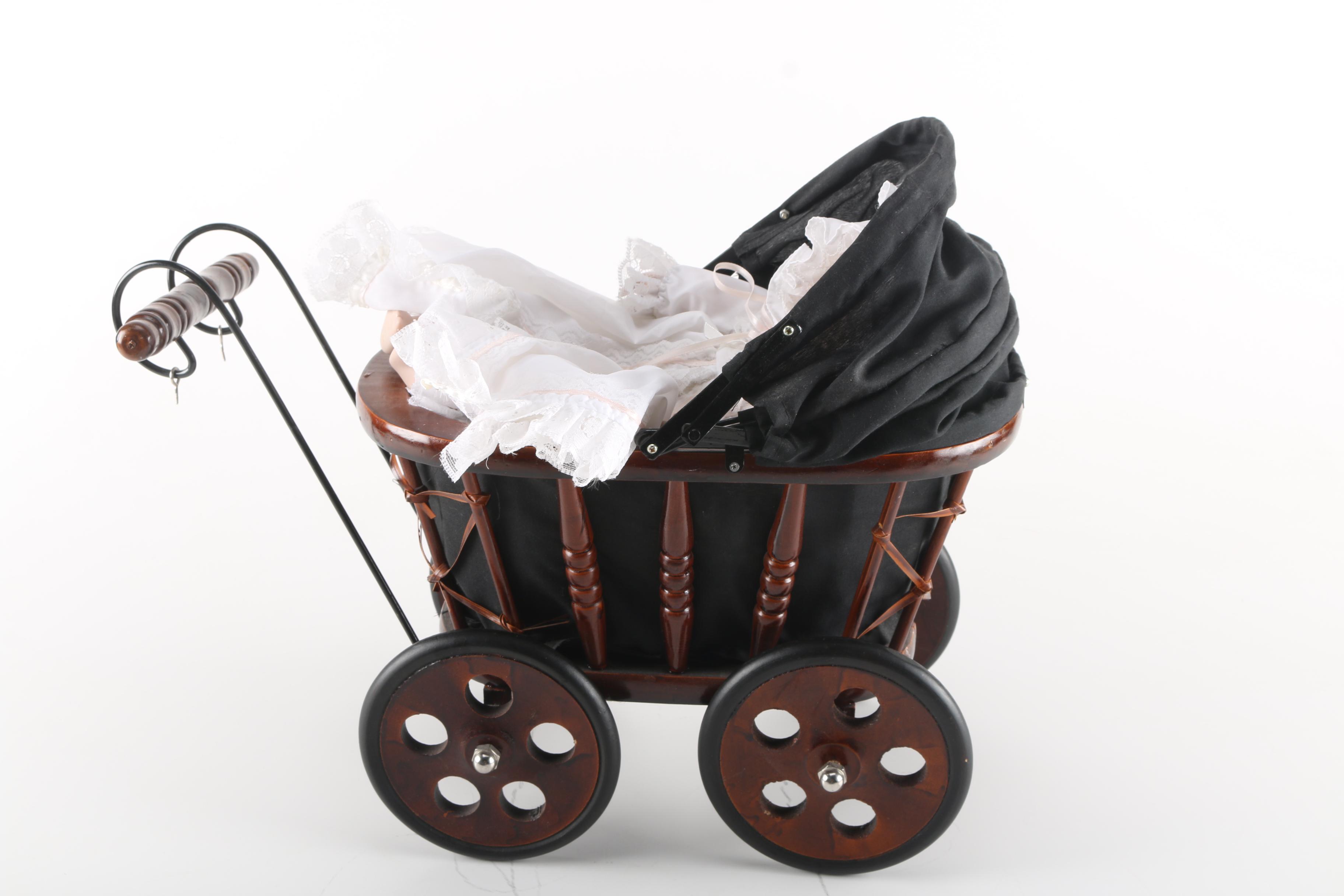 Porcelain Baby Doll in Cherry Finish Doll Pram