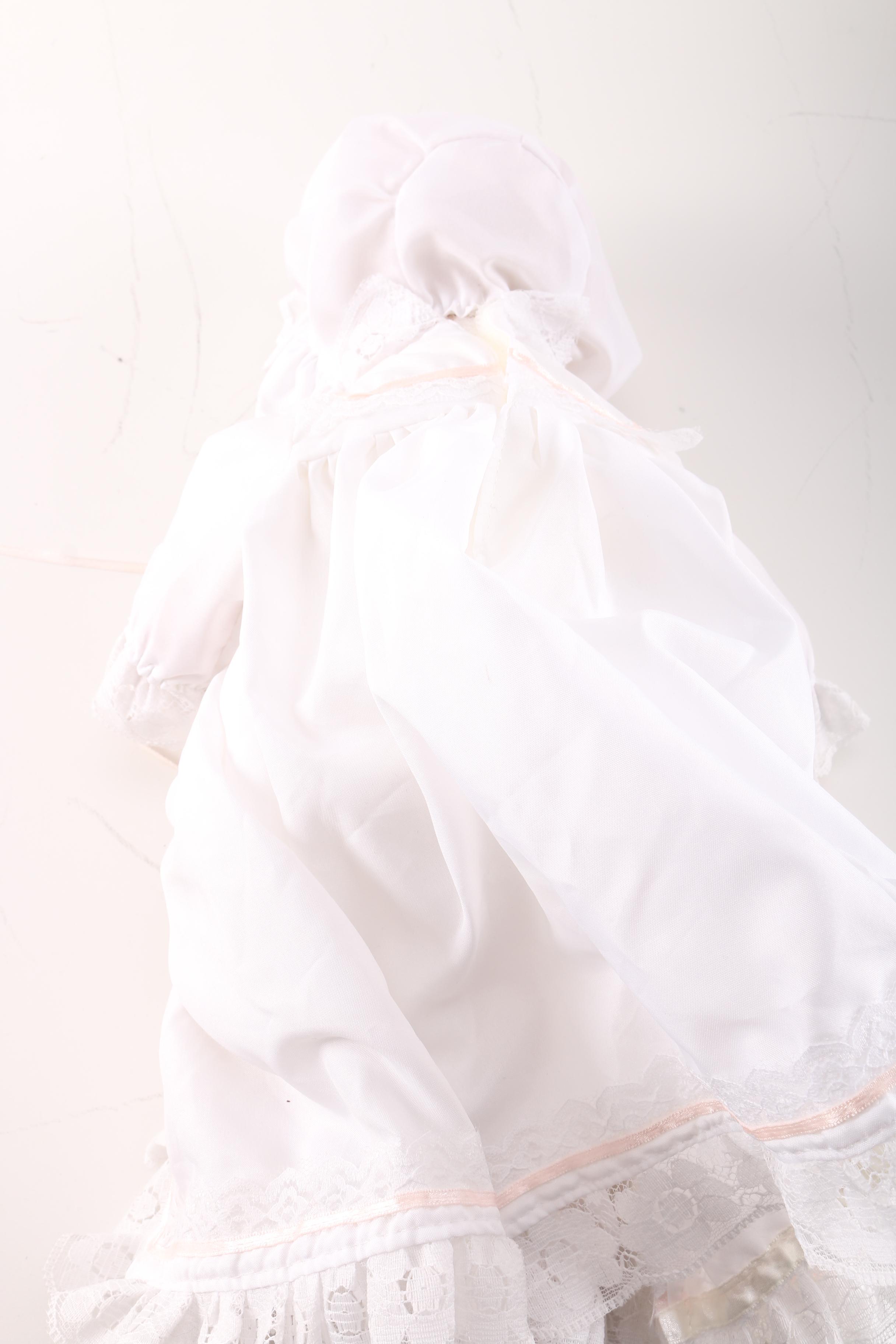 Porcelain Baby Doll in Cherry Finish Doll Pram