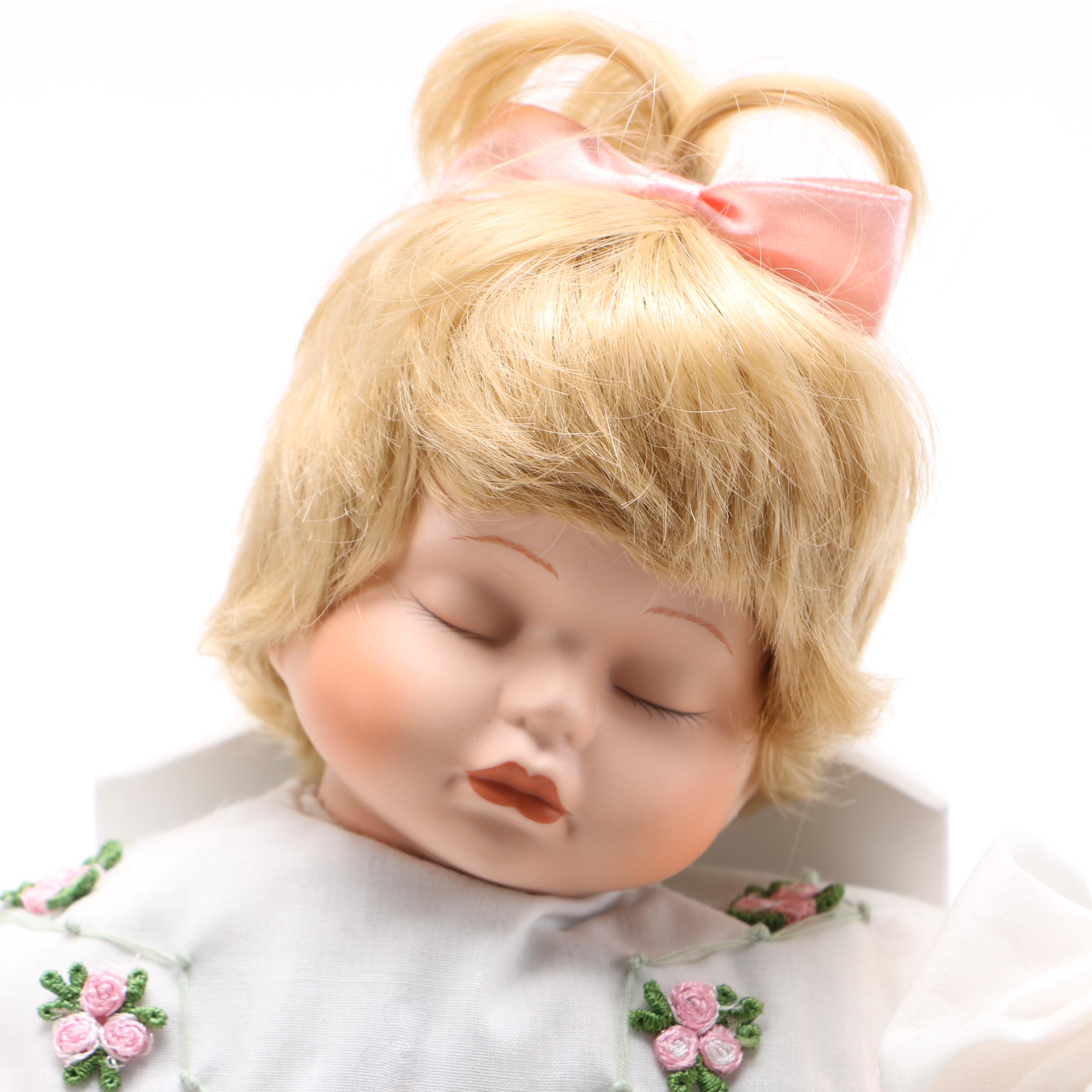Porcelain Doll in Wooden Walker