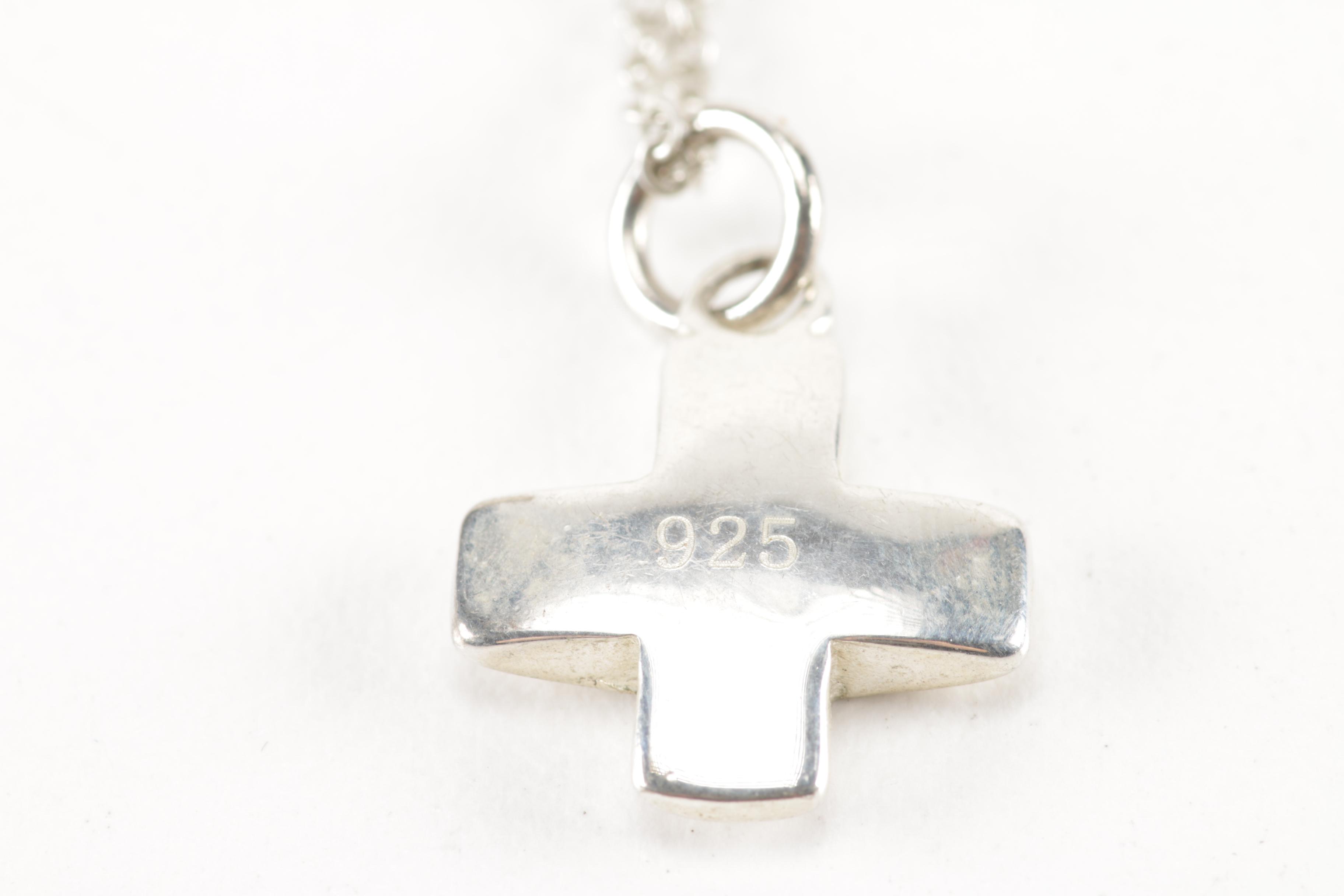 Sterling Silver Jewelry Including a Turquoise Pendant