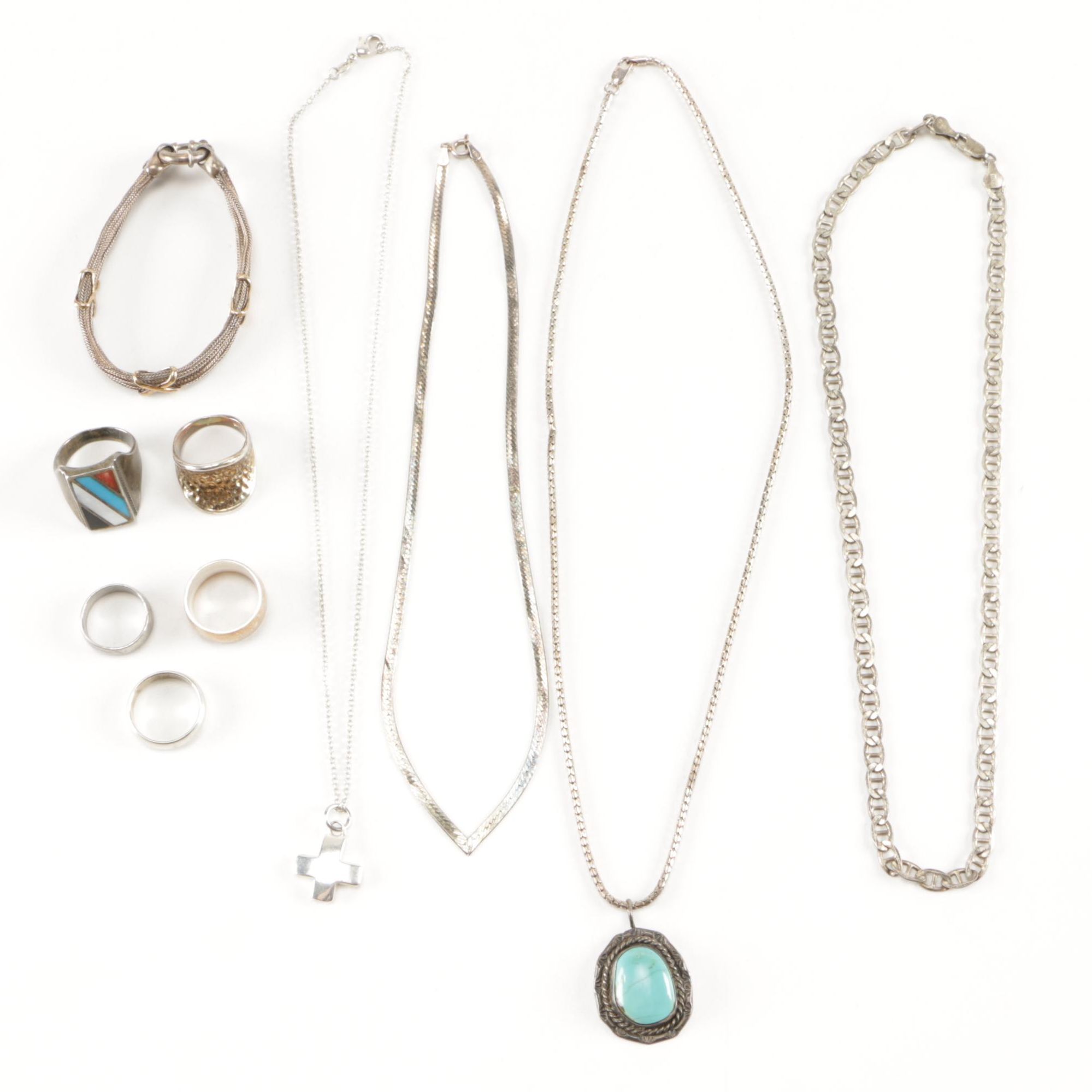 Sterling Silver Jewelry Including a Turquoise Pendant