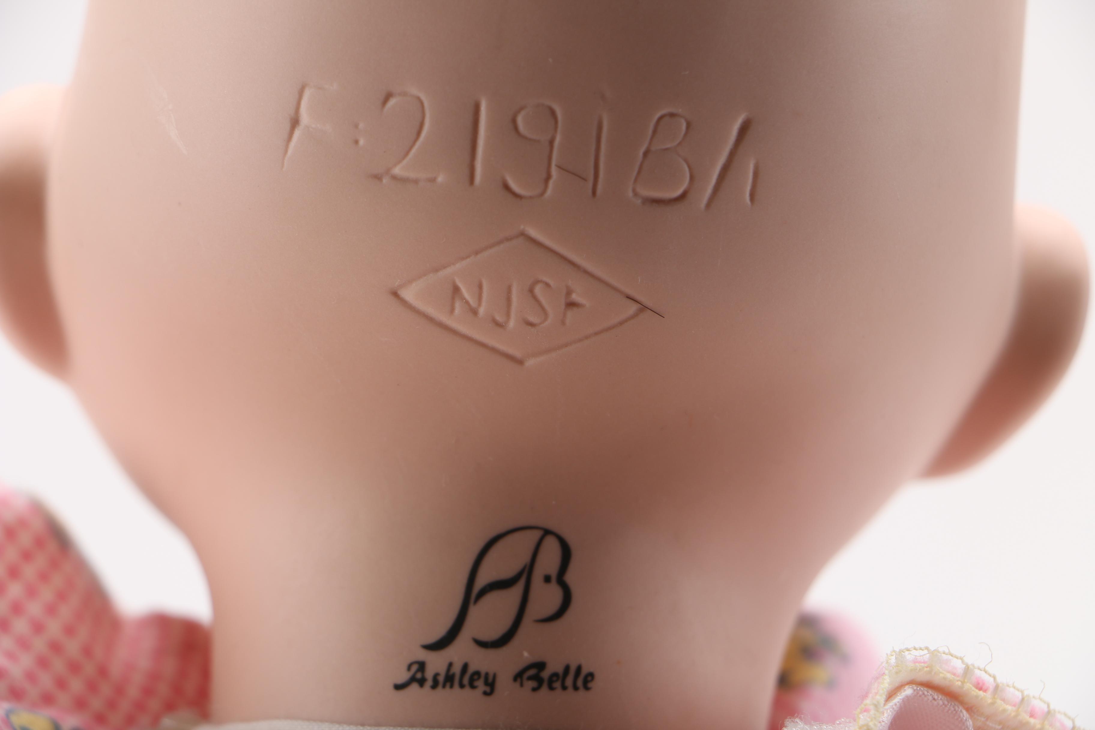 Ashley Belle Porcelain Doll with Pink Pillow