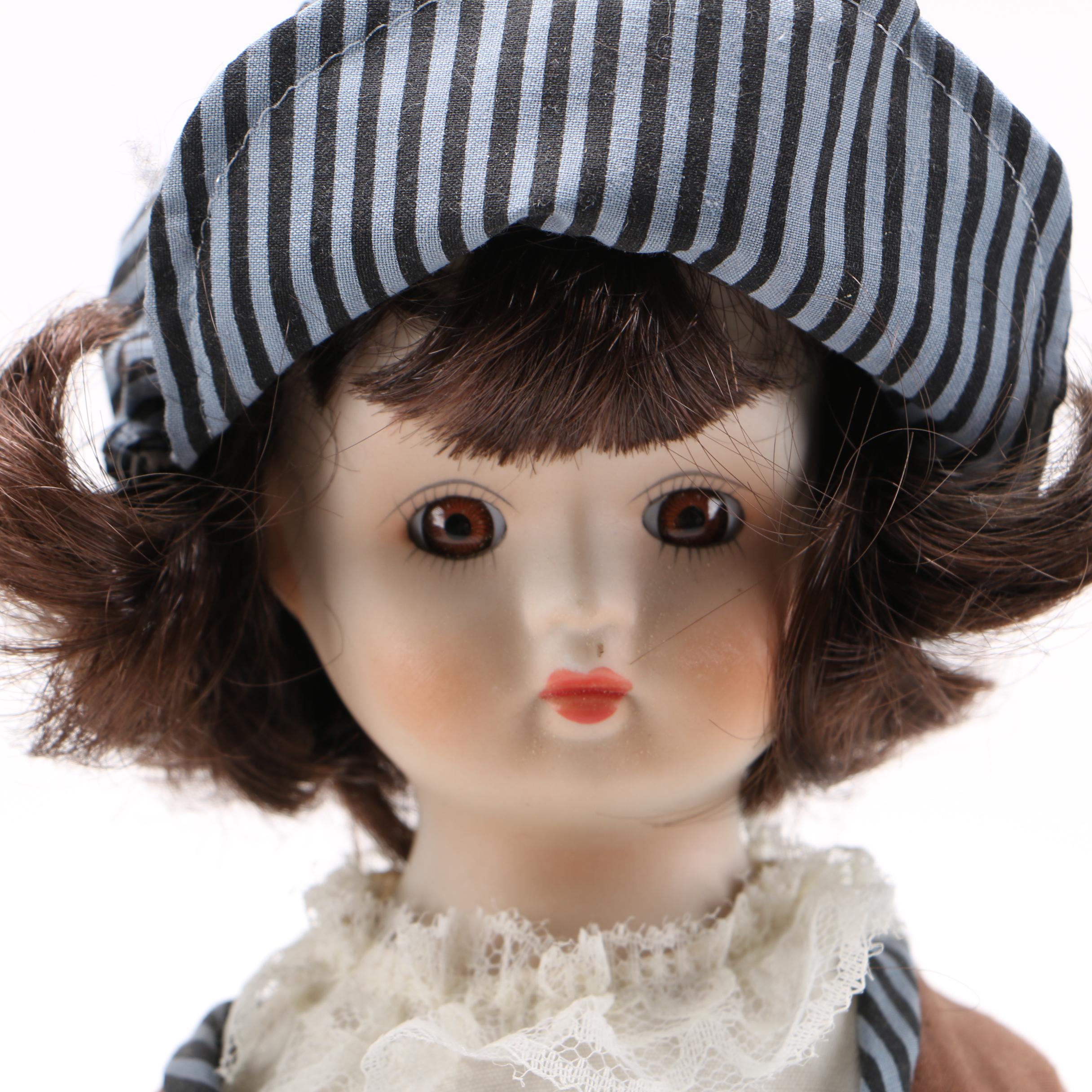 Pair of Porcelain Dolls