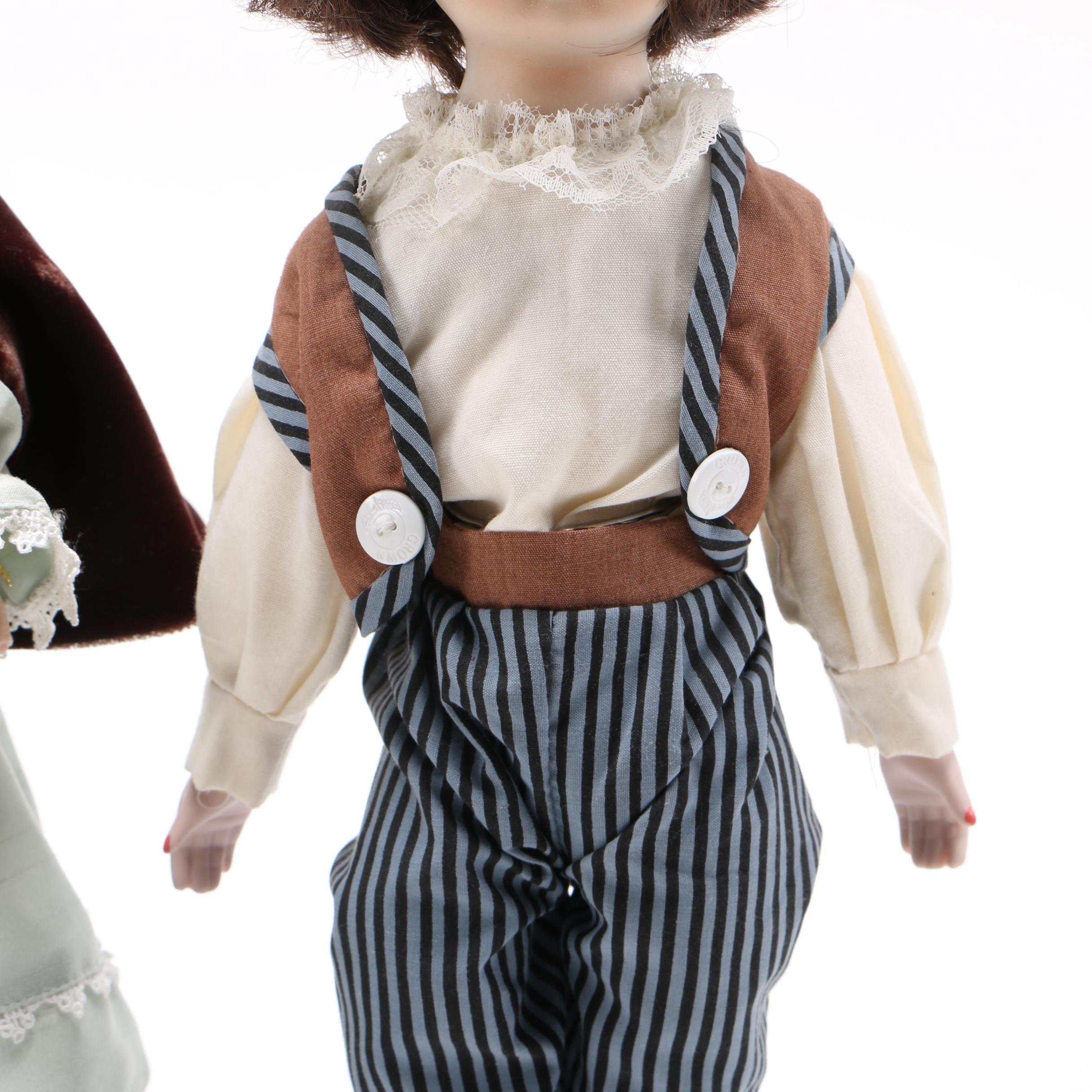 Pair of Porcelain Dolls