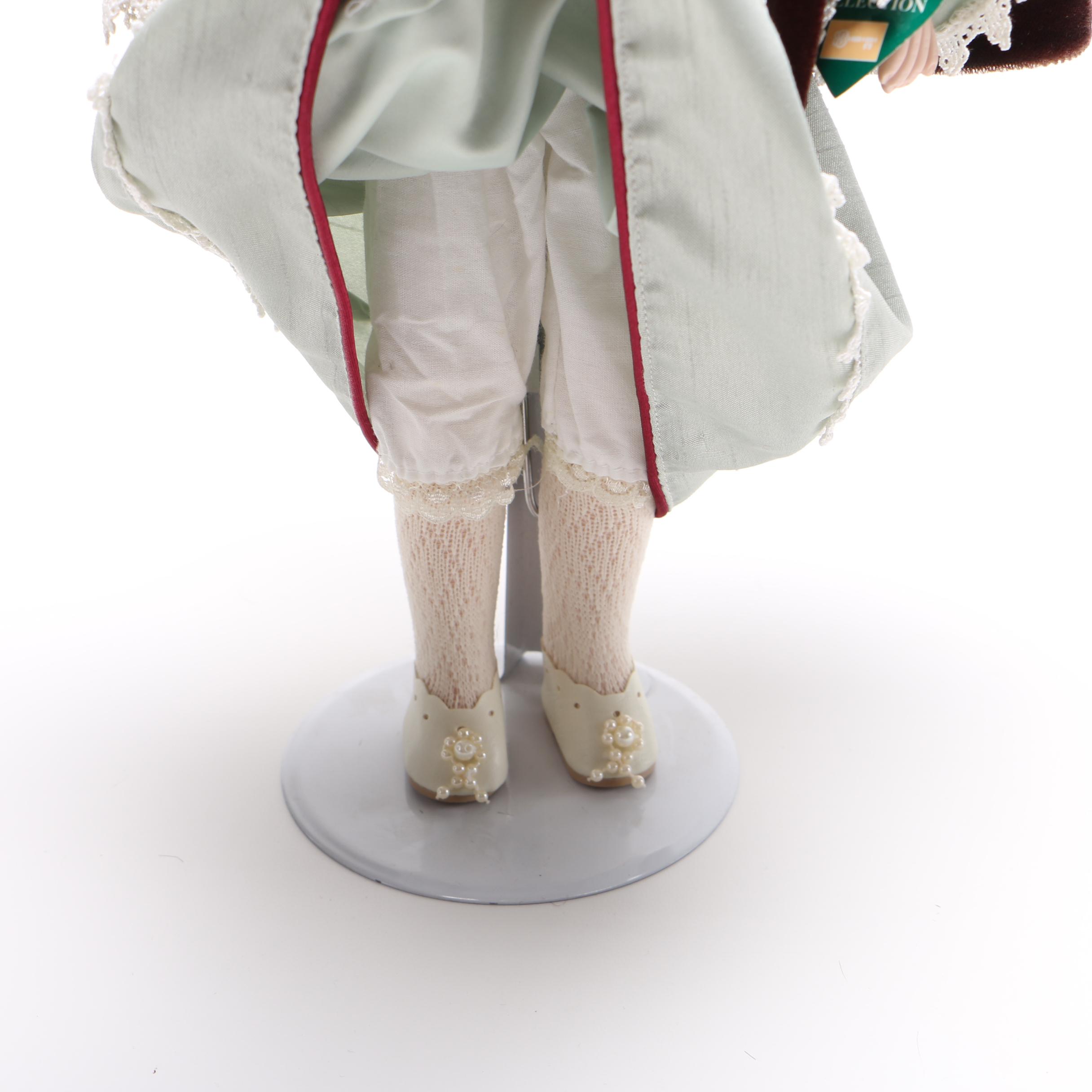 Pair of Porcelain Dolls