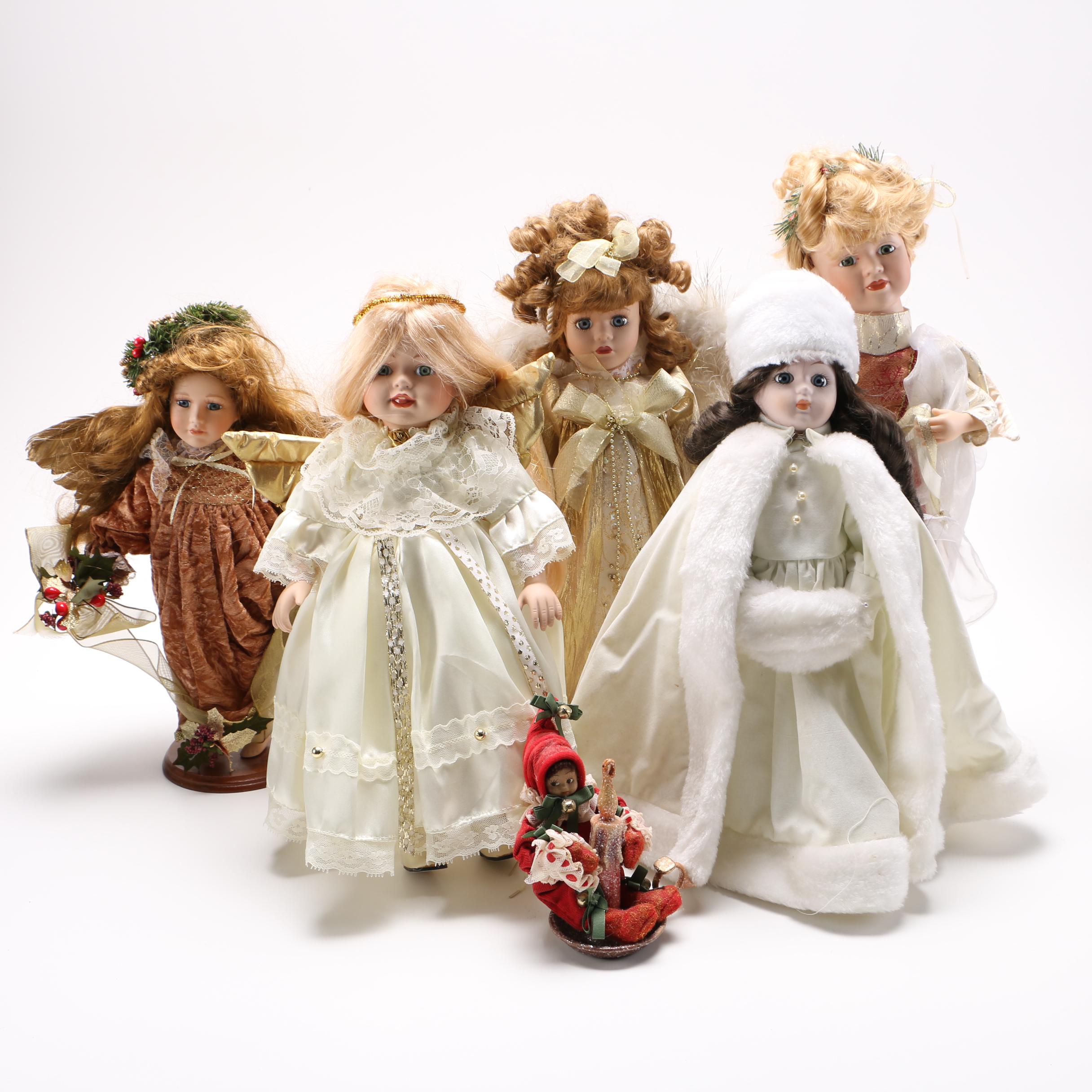 Collection of Winter Themed Porcelain Dolls