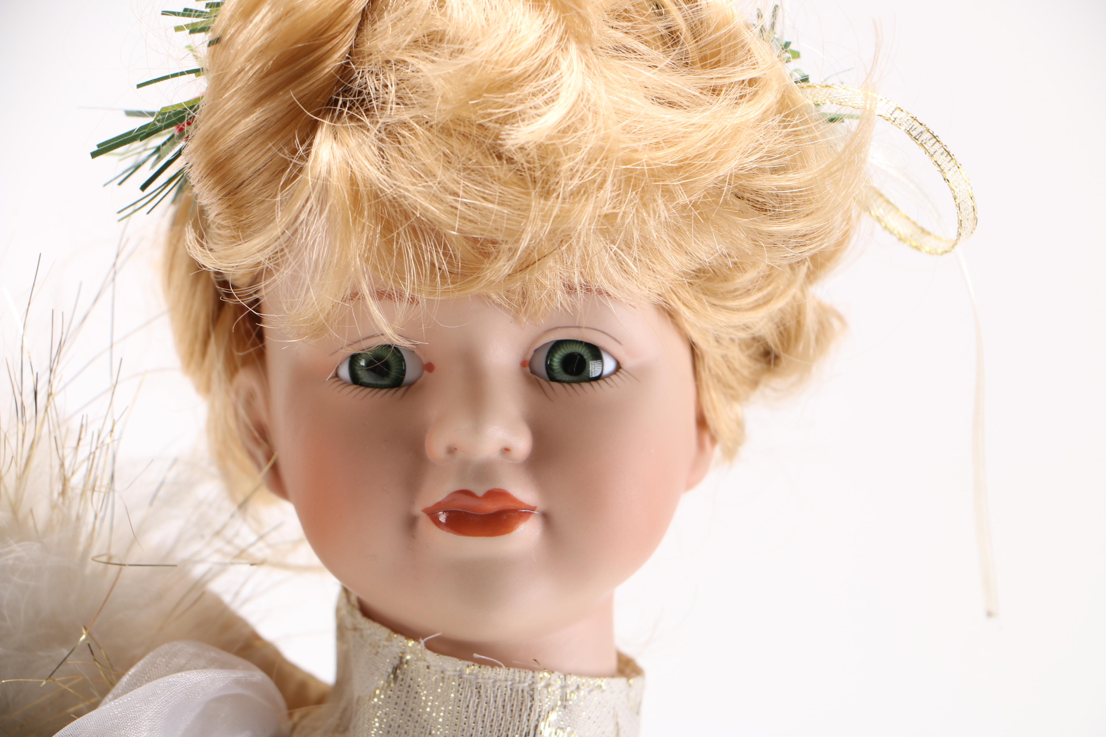 Collection of Winter Themed Porcelain Dolls