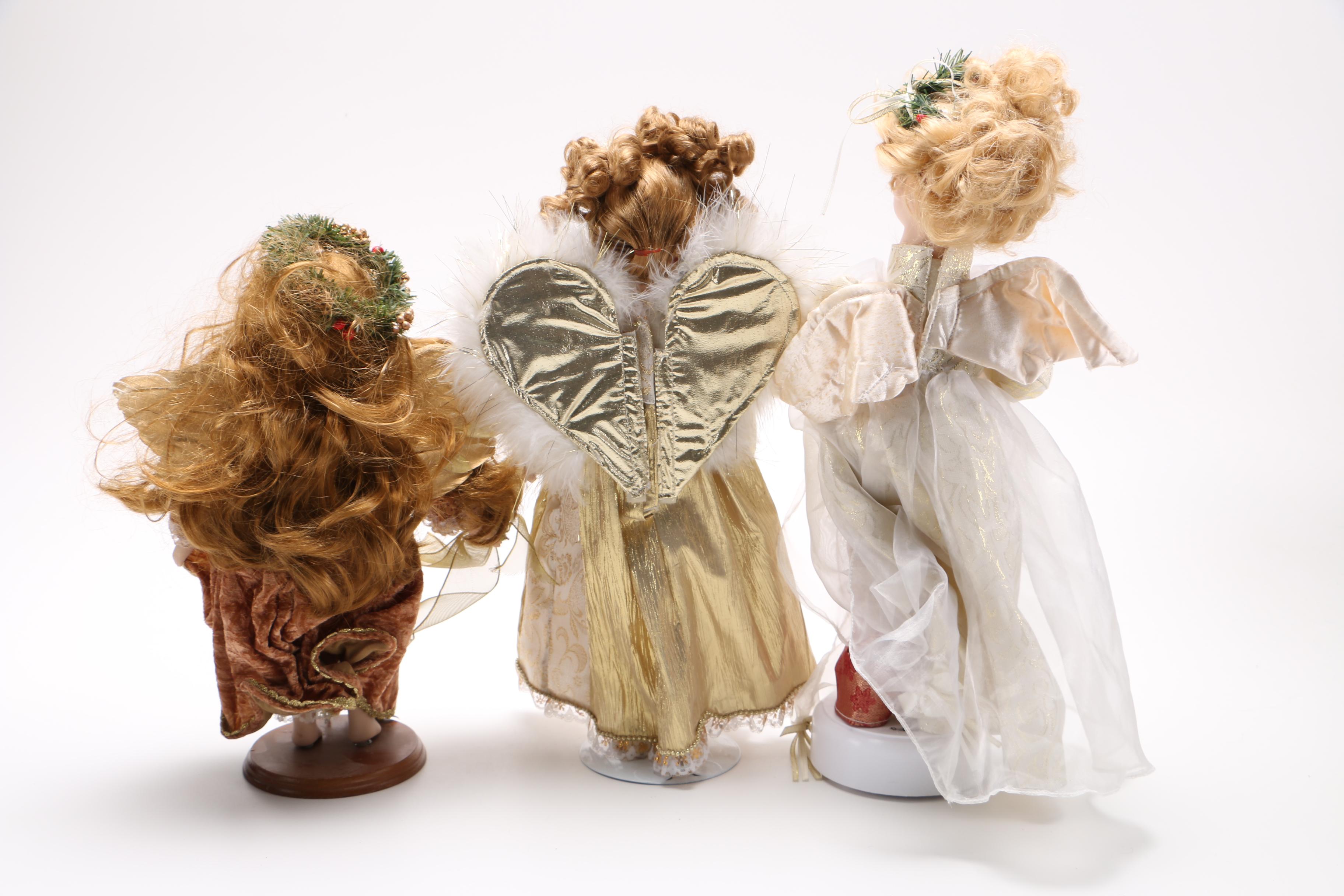 Collection of Winter Themed Porcelain Dolls