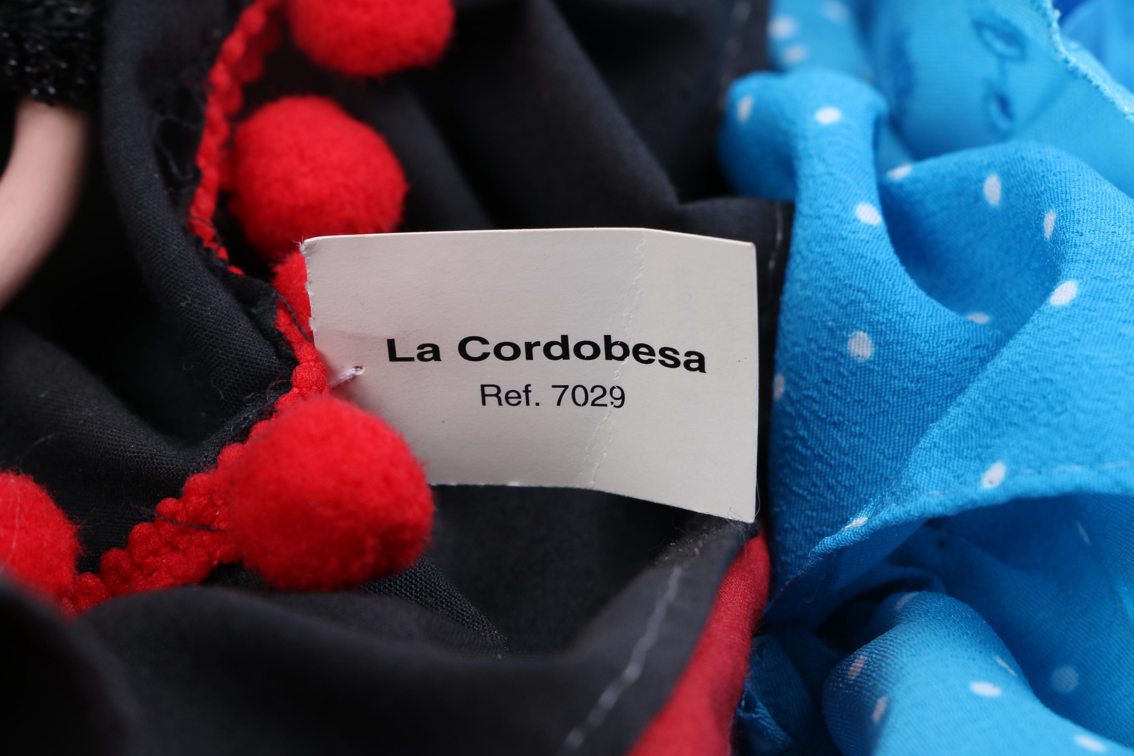 Porcelain Dolls in Mexican and Spanish Dress Featuring a Marin Chiclana