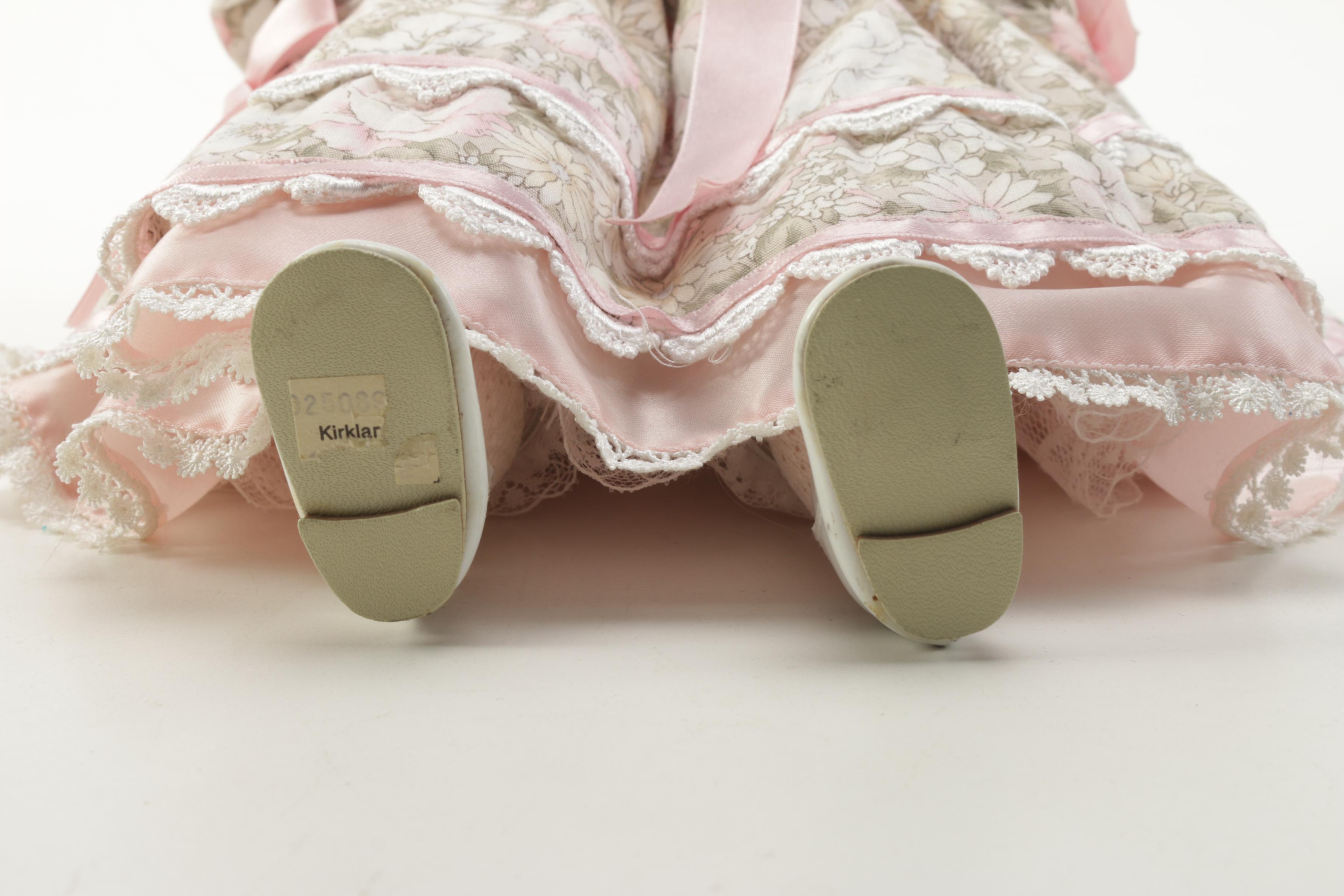 Porcelain Doll in Chair