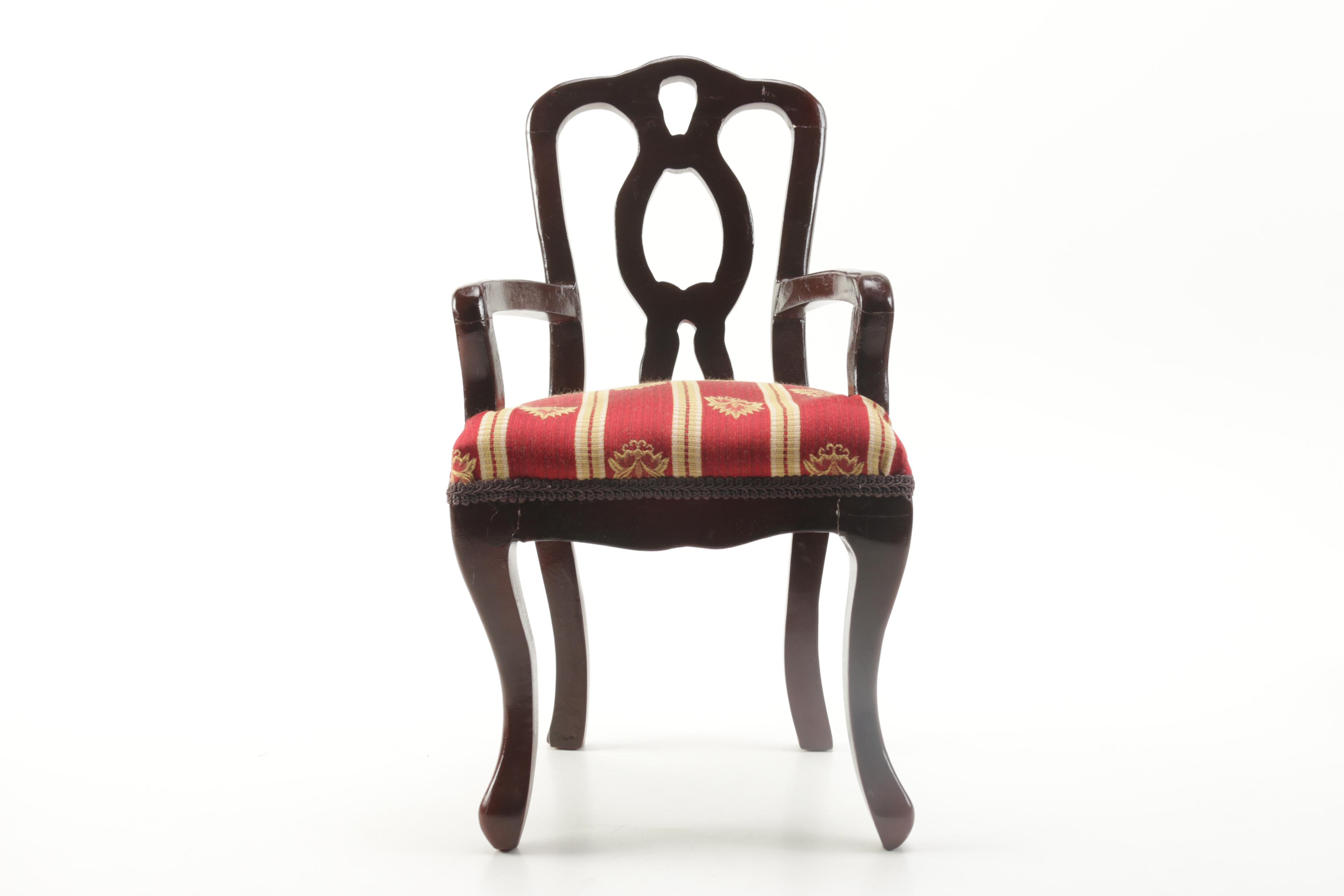 Porcelain Doll in Chair