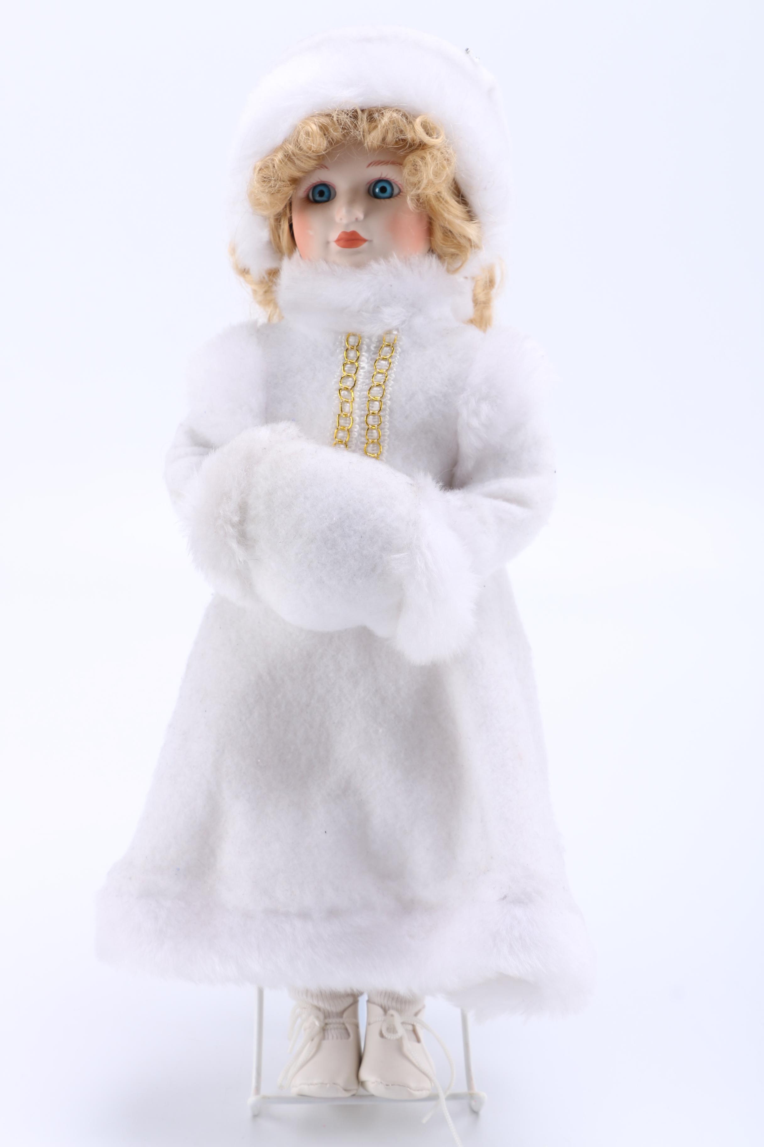 Pair of Porcelain Dolls