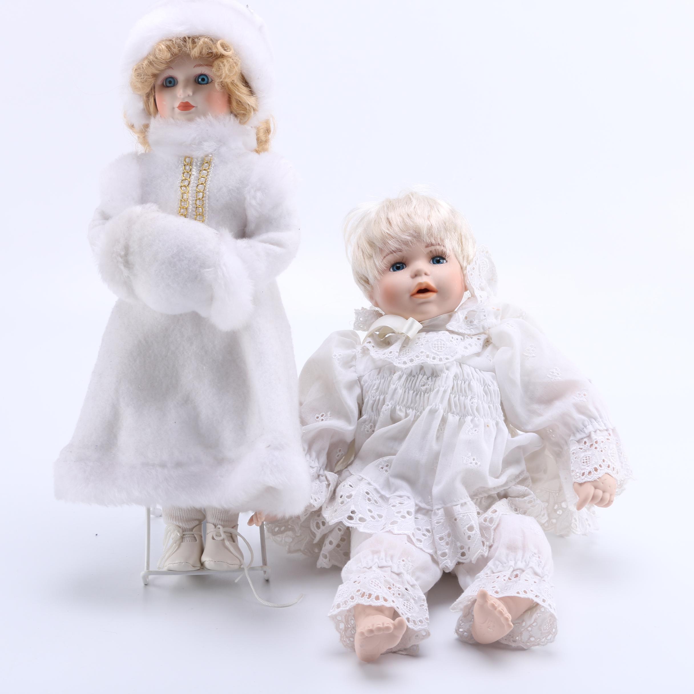 Pair of Porcelain Dolls