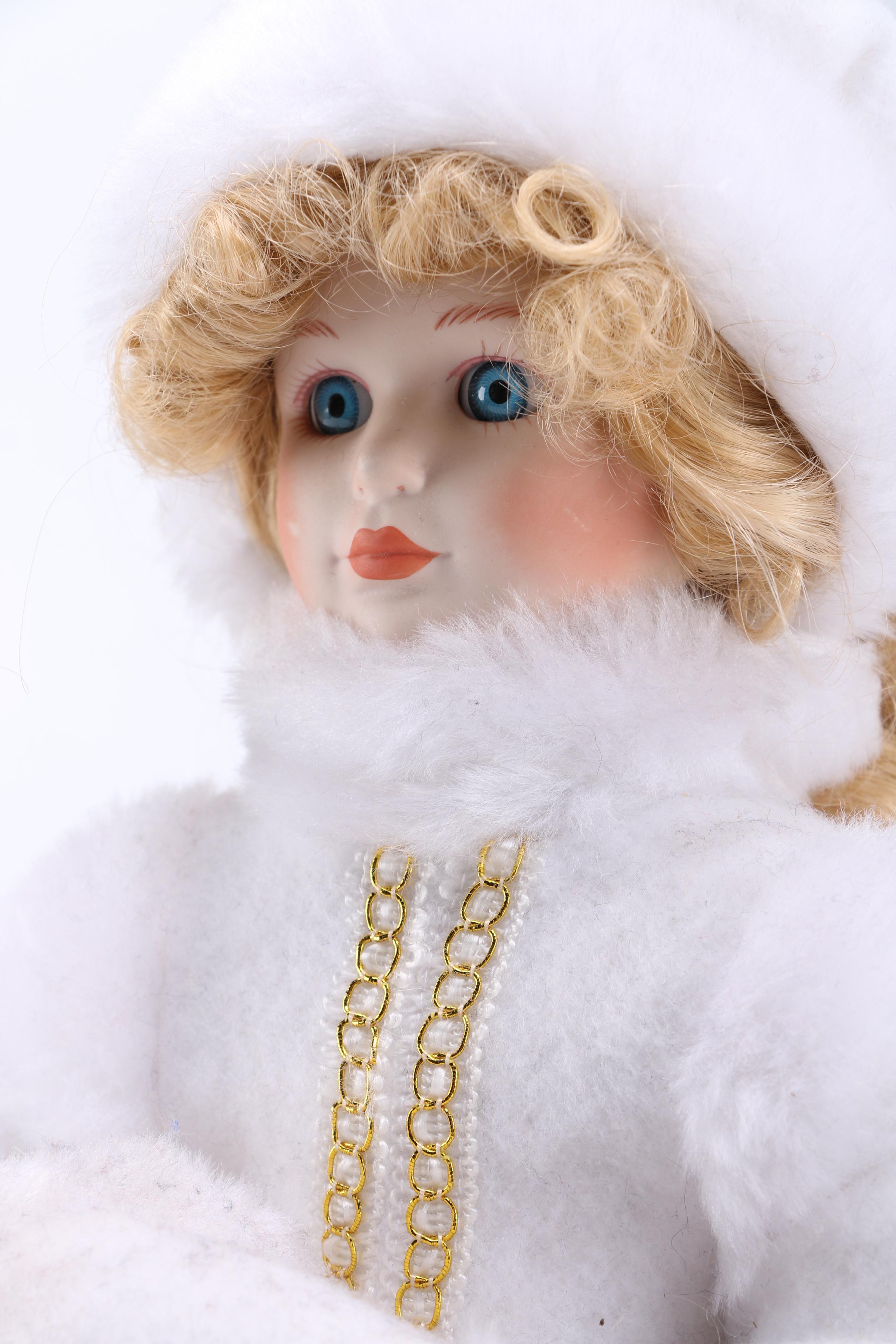 Pair of Porcelain Dolls