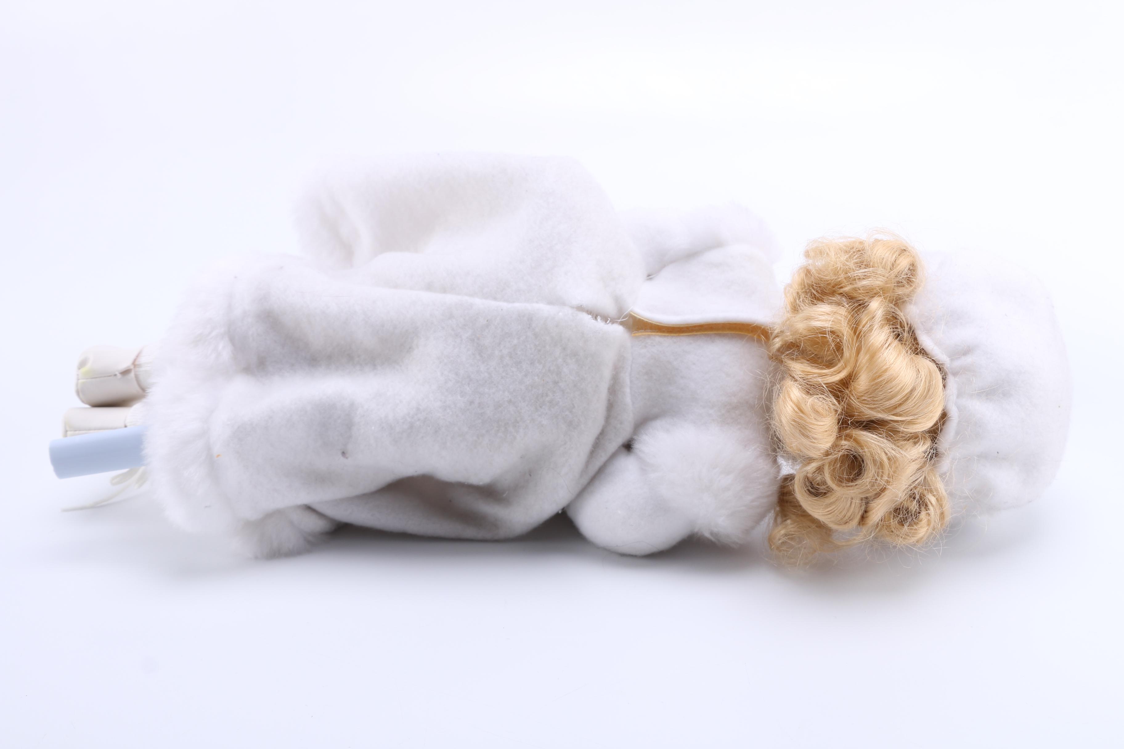 Pair of Porcelain Dolls