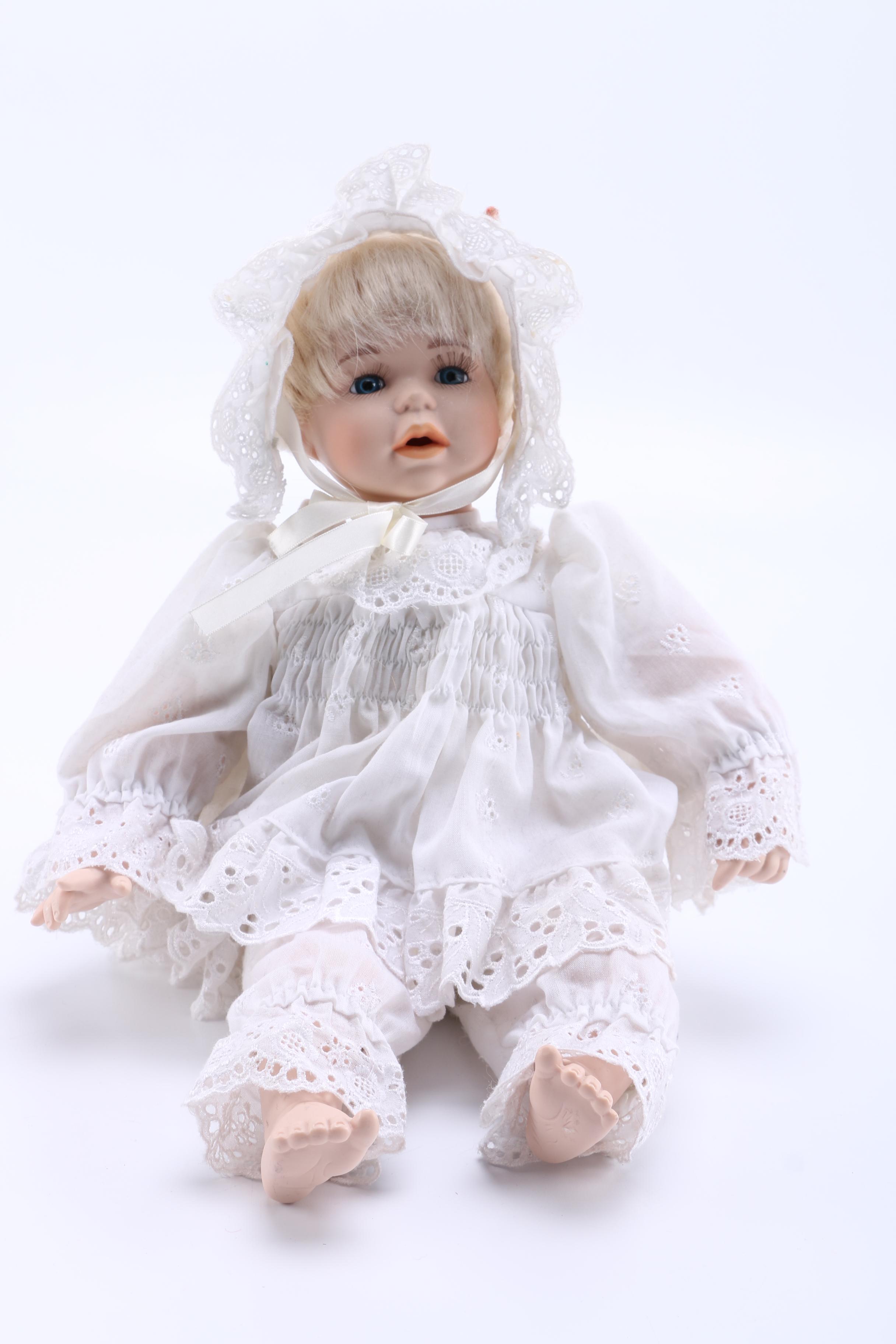 Pair of Porcelain Dolls