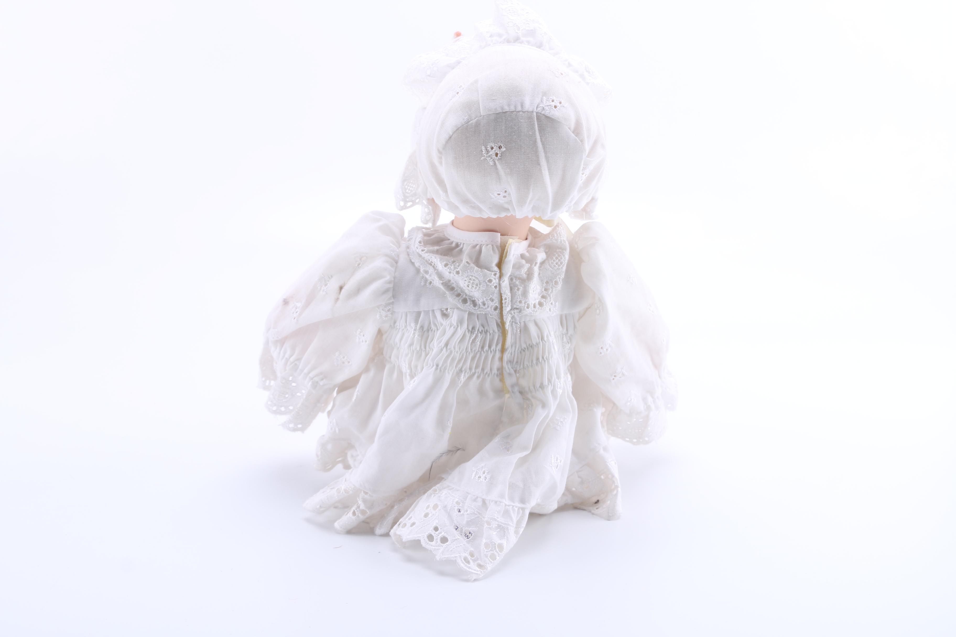 Pair of Porcelain Dolls