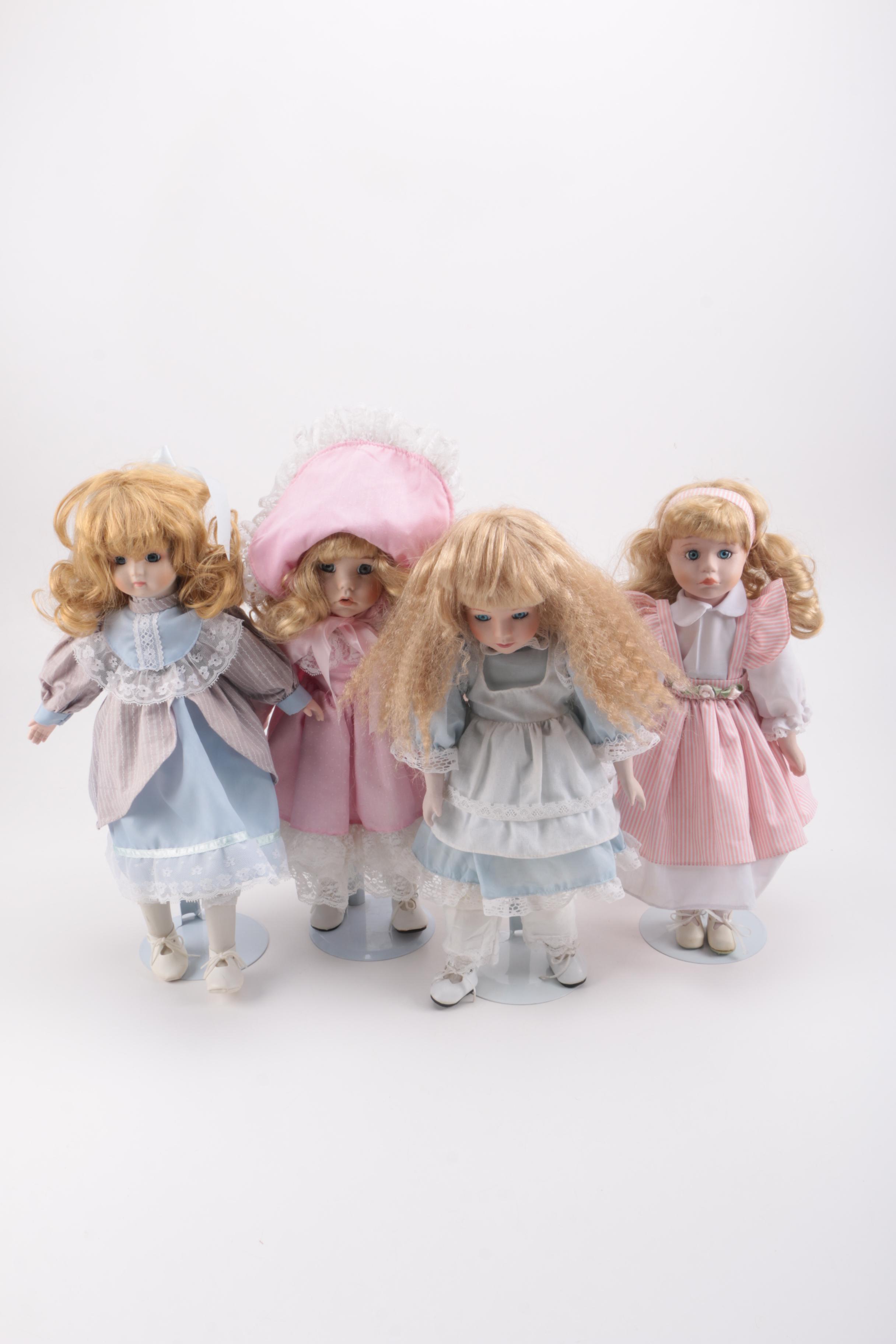 Blue and Pink Dressed Porcelain Dolls