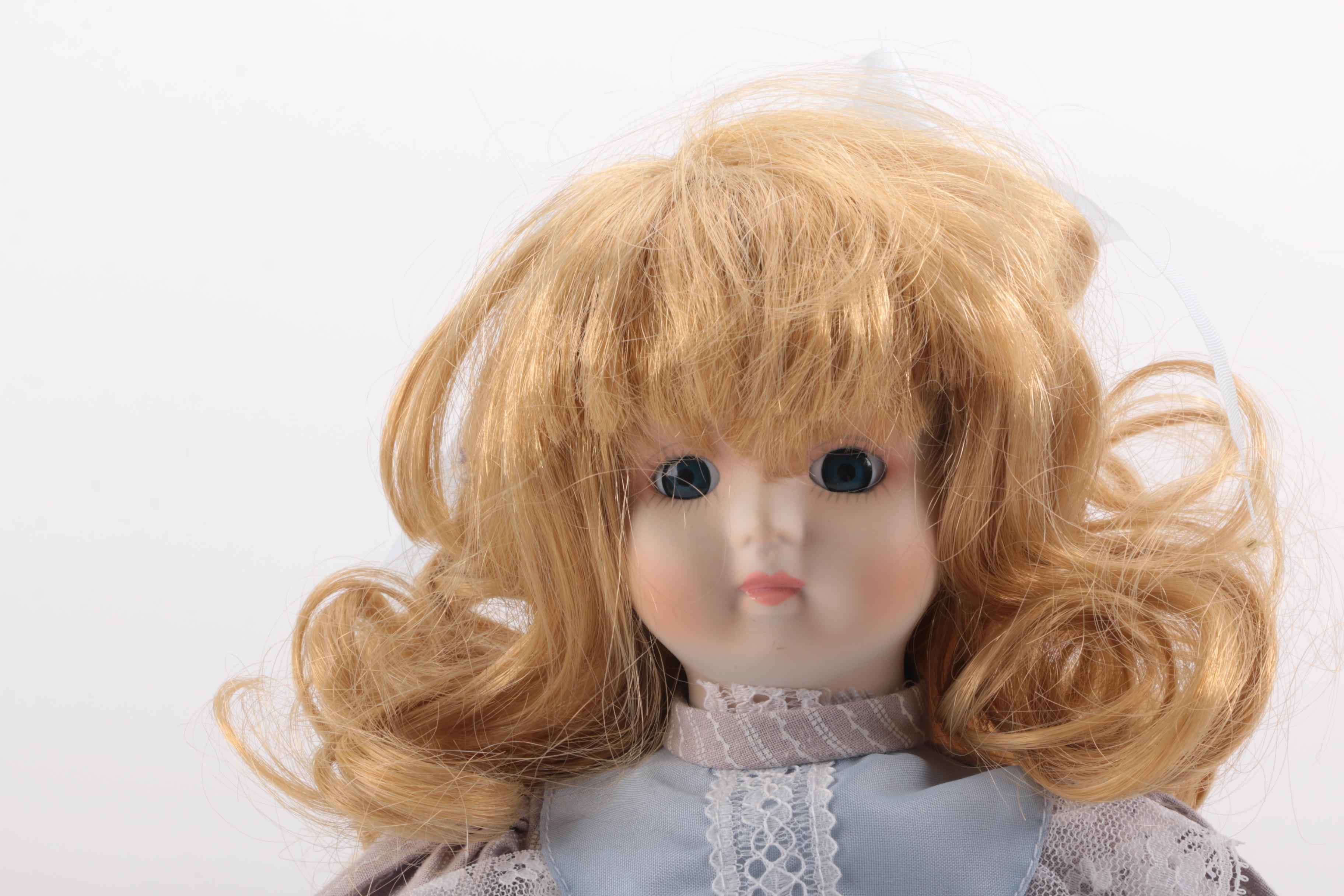 Blue and Pink Dressed Porcelain Dolls