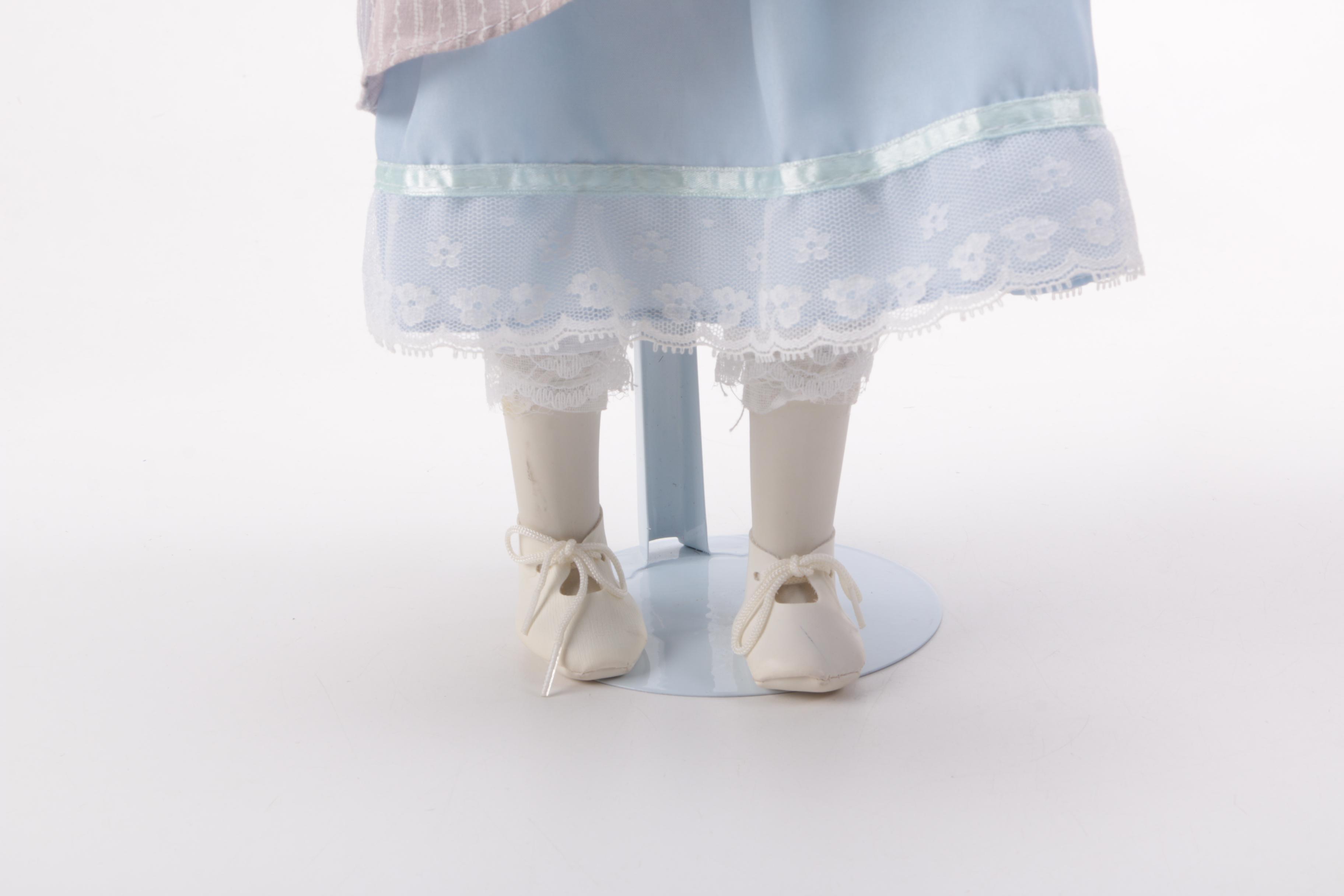 Blue and Pink Dressed Porcelain Dolls