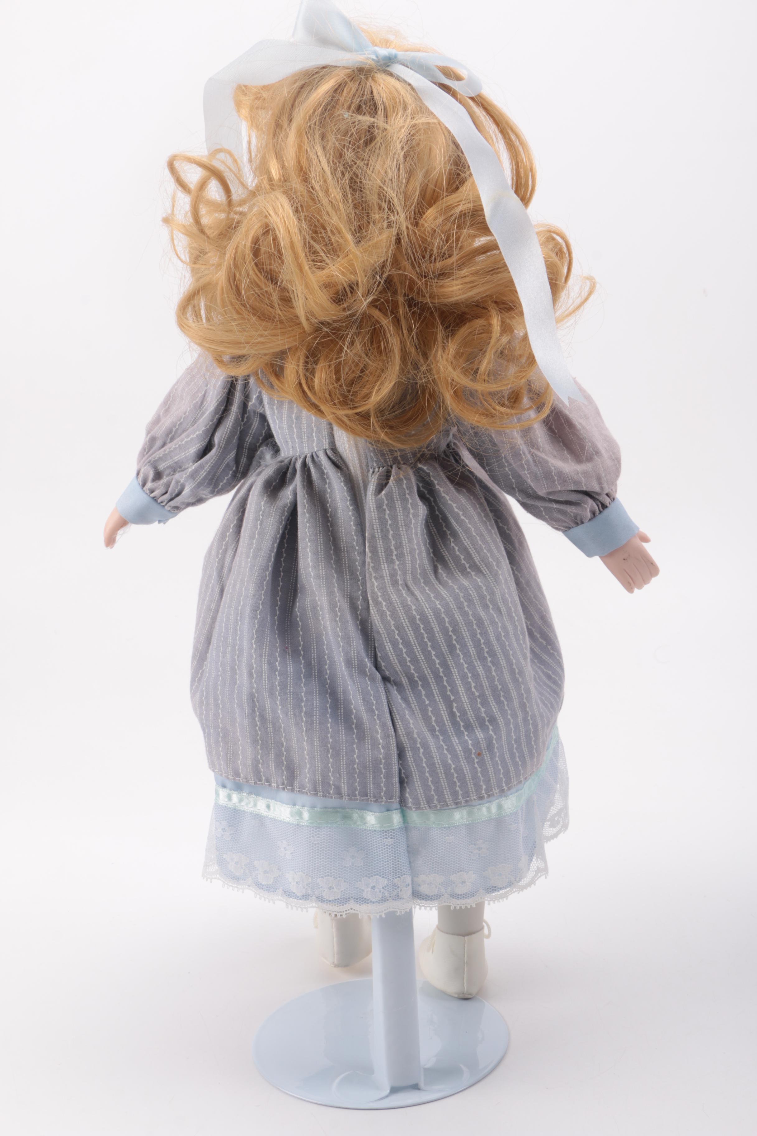 Blue and Pink Dressed Porcelain Dolls