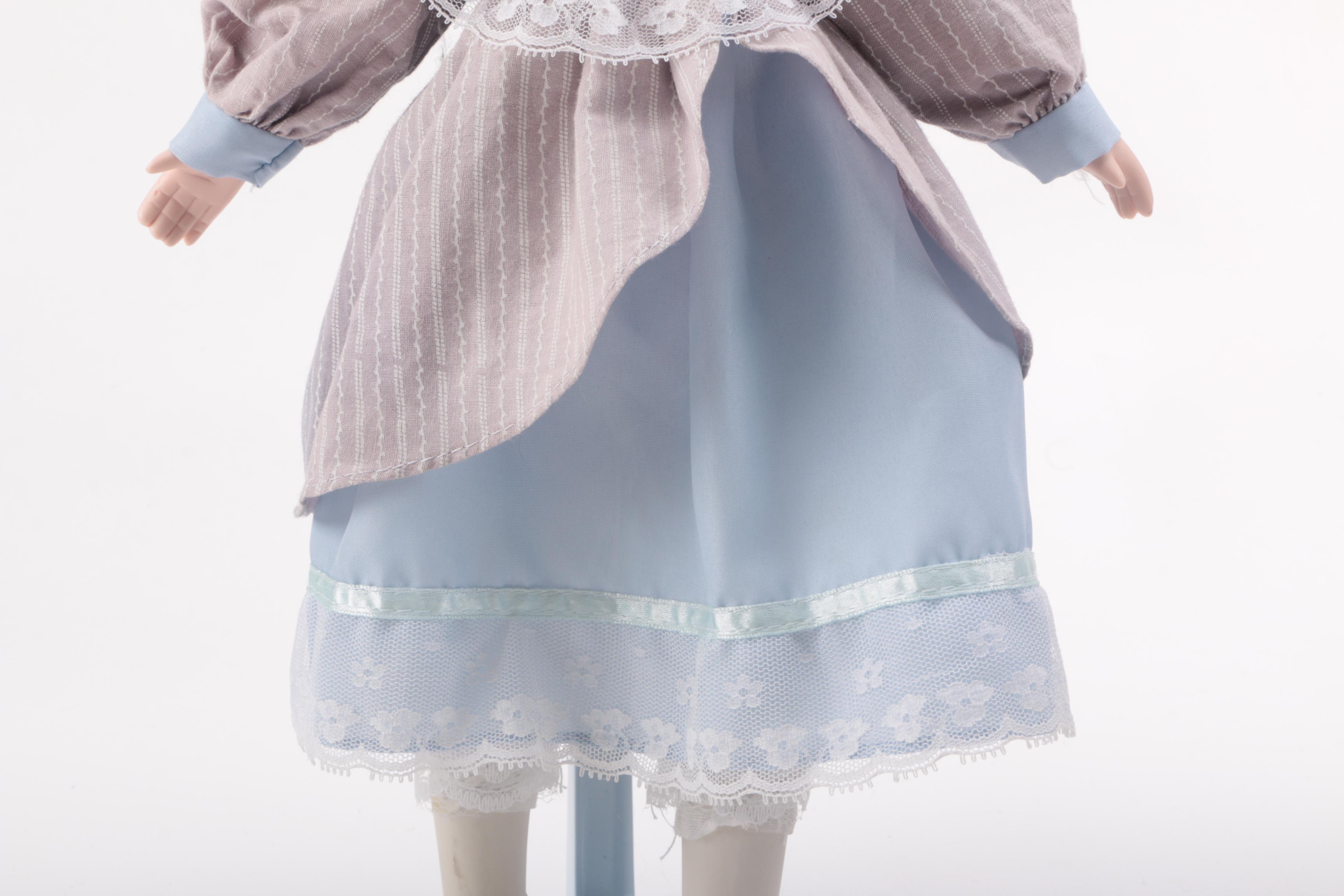 Blue and Pink Dressed Porcelain Dolls