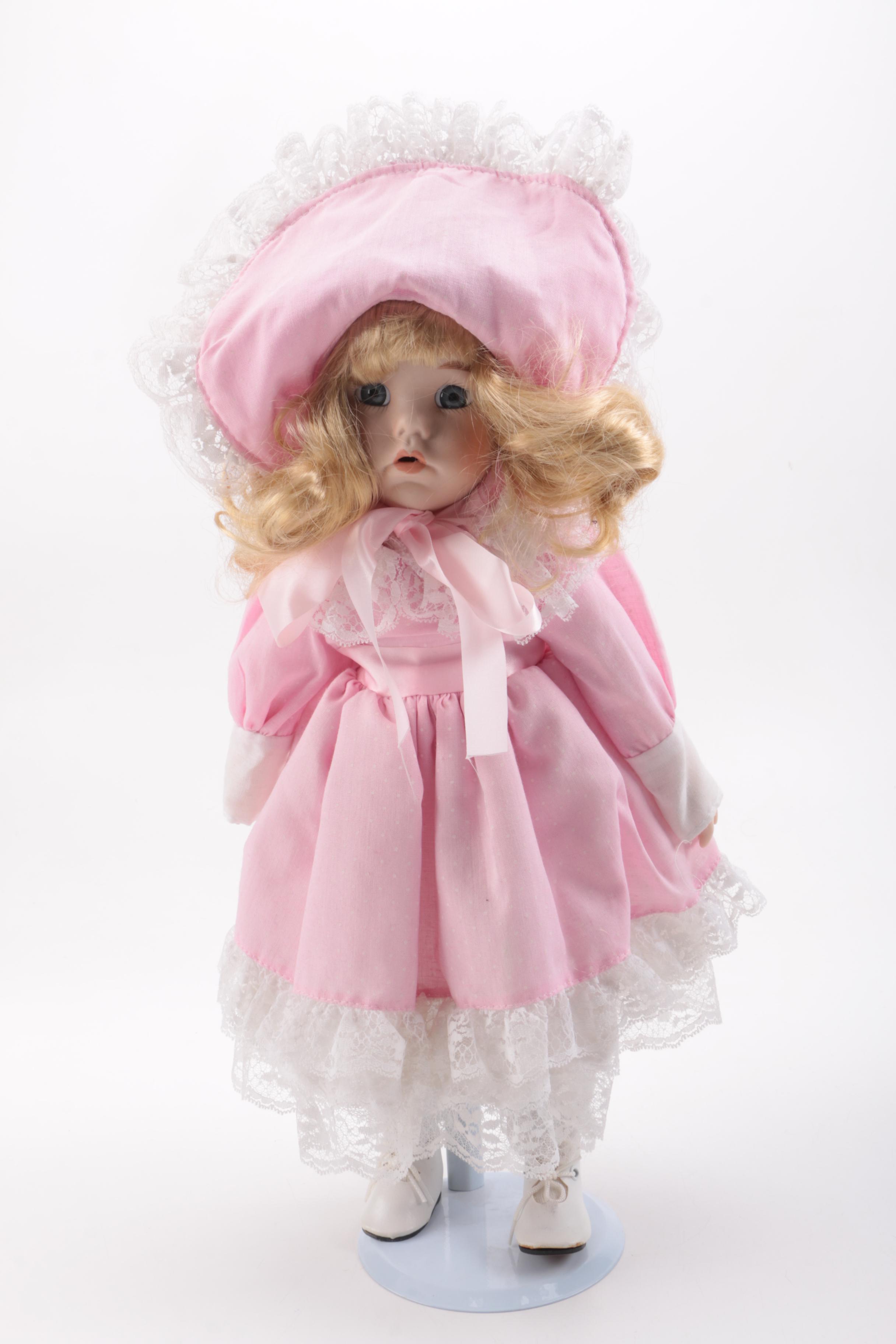 Blue and Pink Dressed Porcelain Dolls