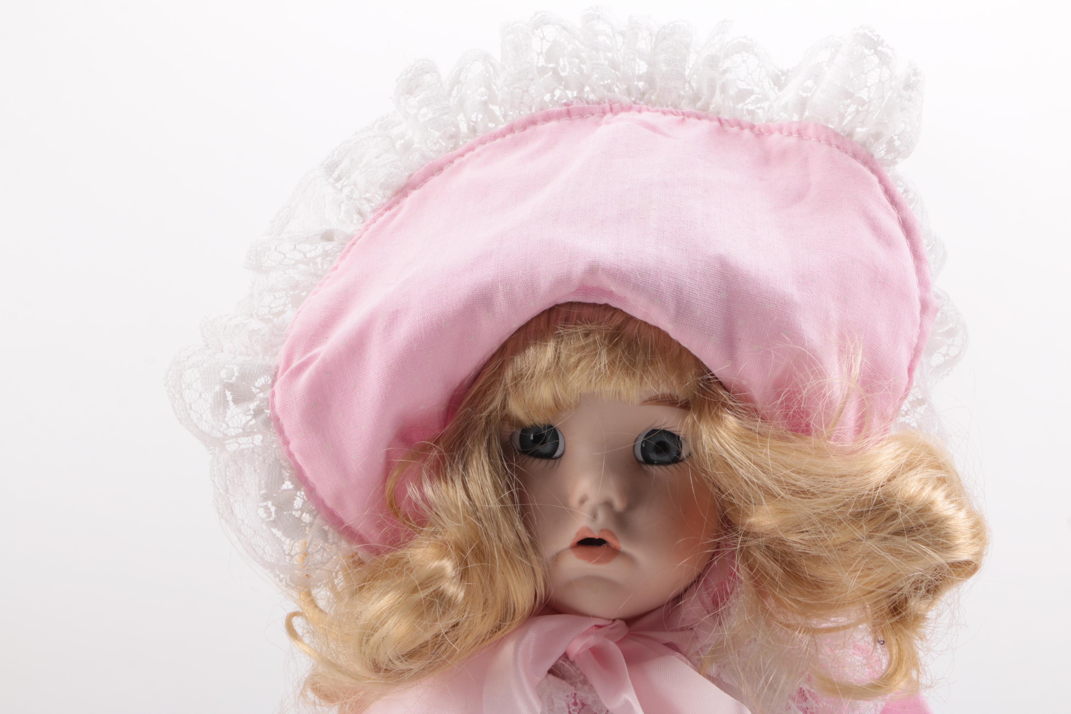 Blue and Pink Dressed Porcelain Dolls