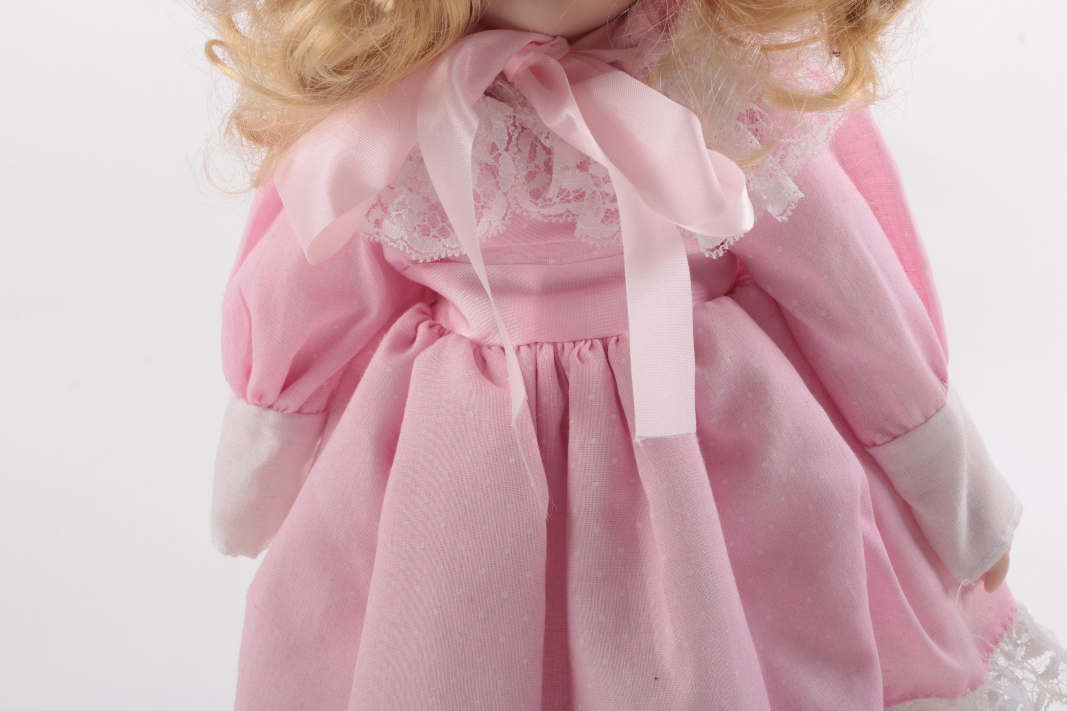 Blue and Pink Dressed Porcelain Dolls