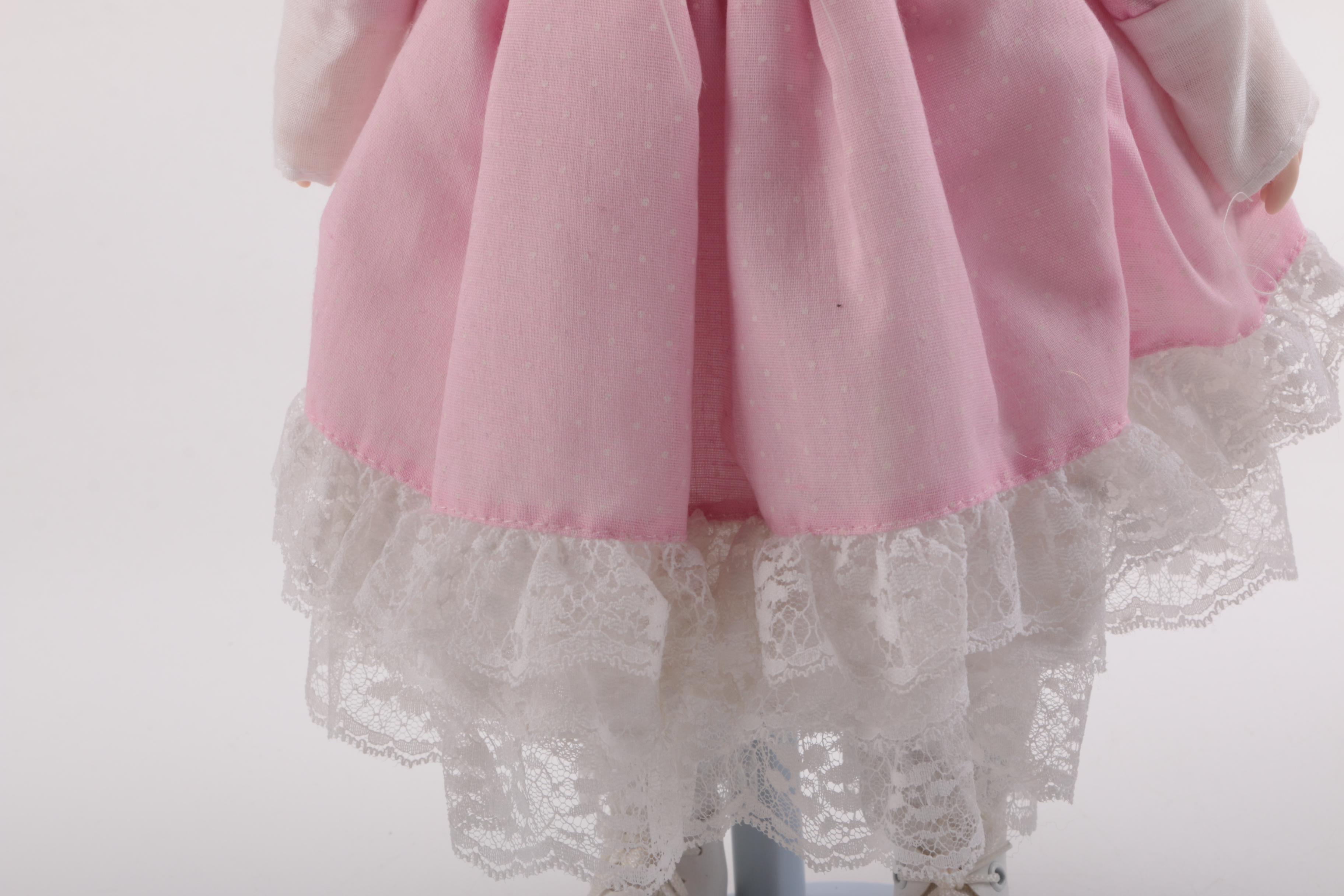 Blue and Pink Dressed Porcelain Dolls