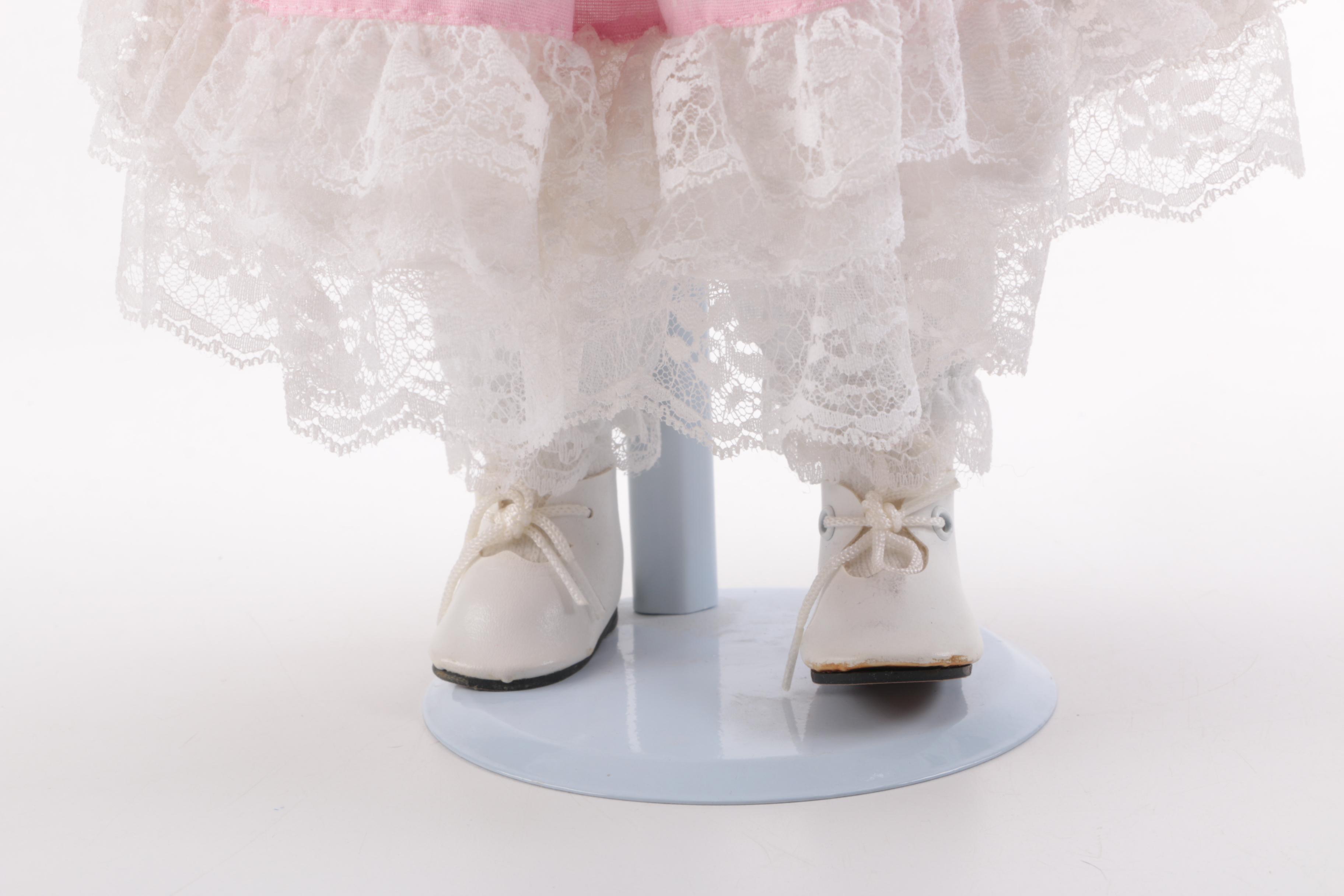 Blue and Pink Dressed Porcelain Dolls