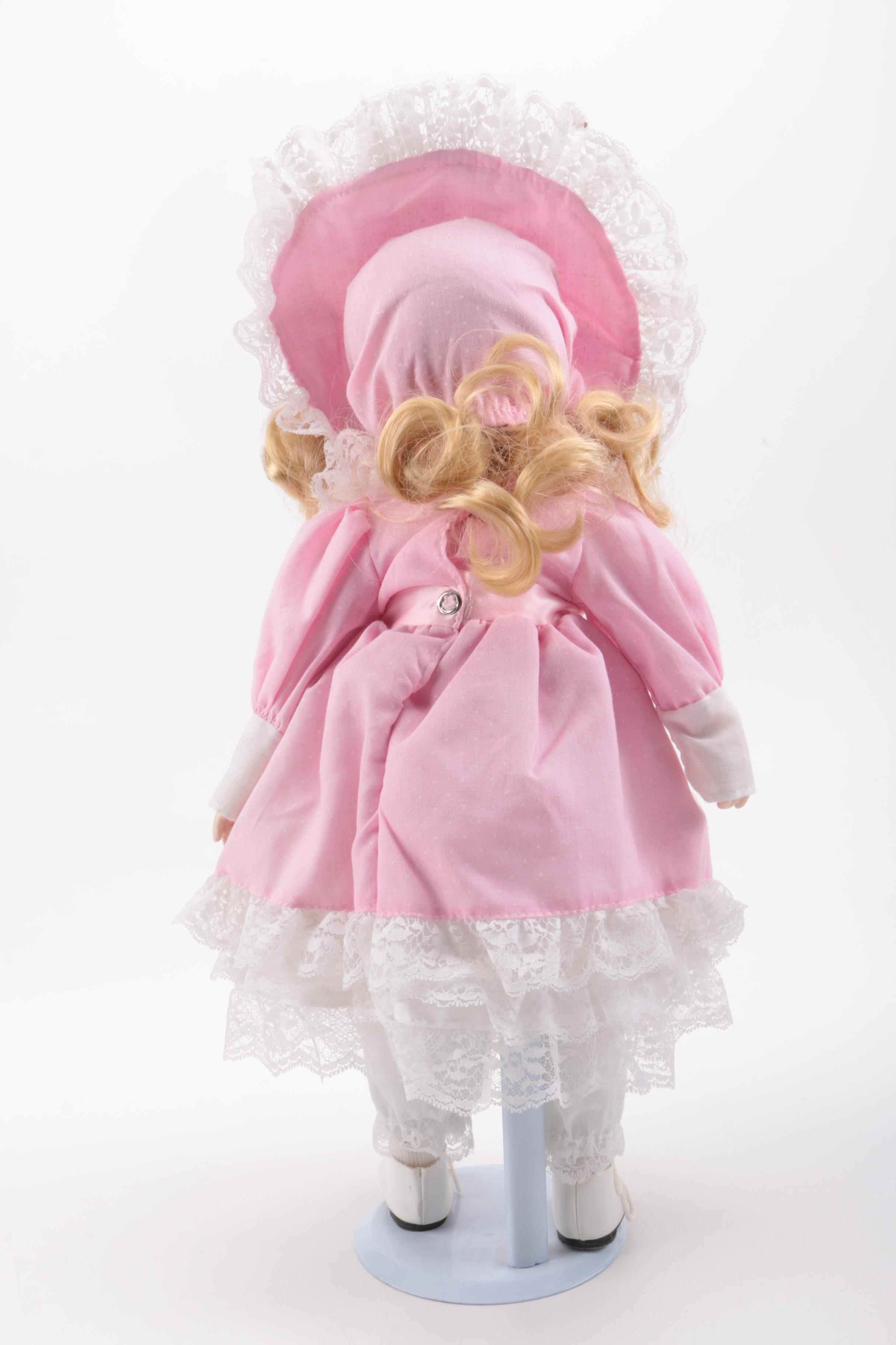 Blue and Pink Dressed Porcelain Dolls