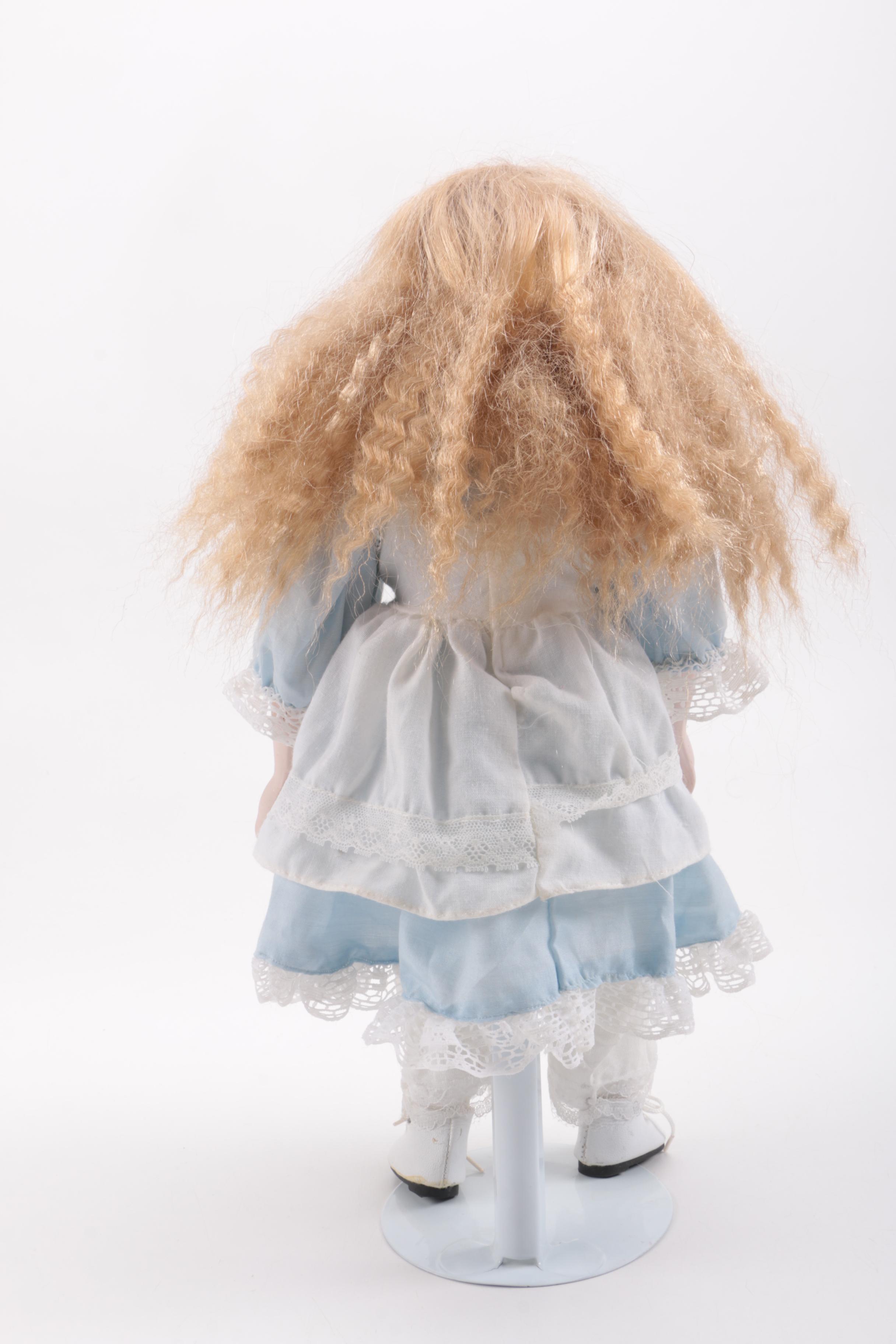 Blue and Pink Dressed Porcelain Dolls