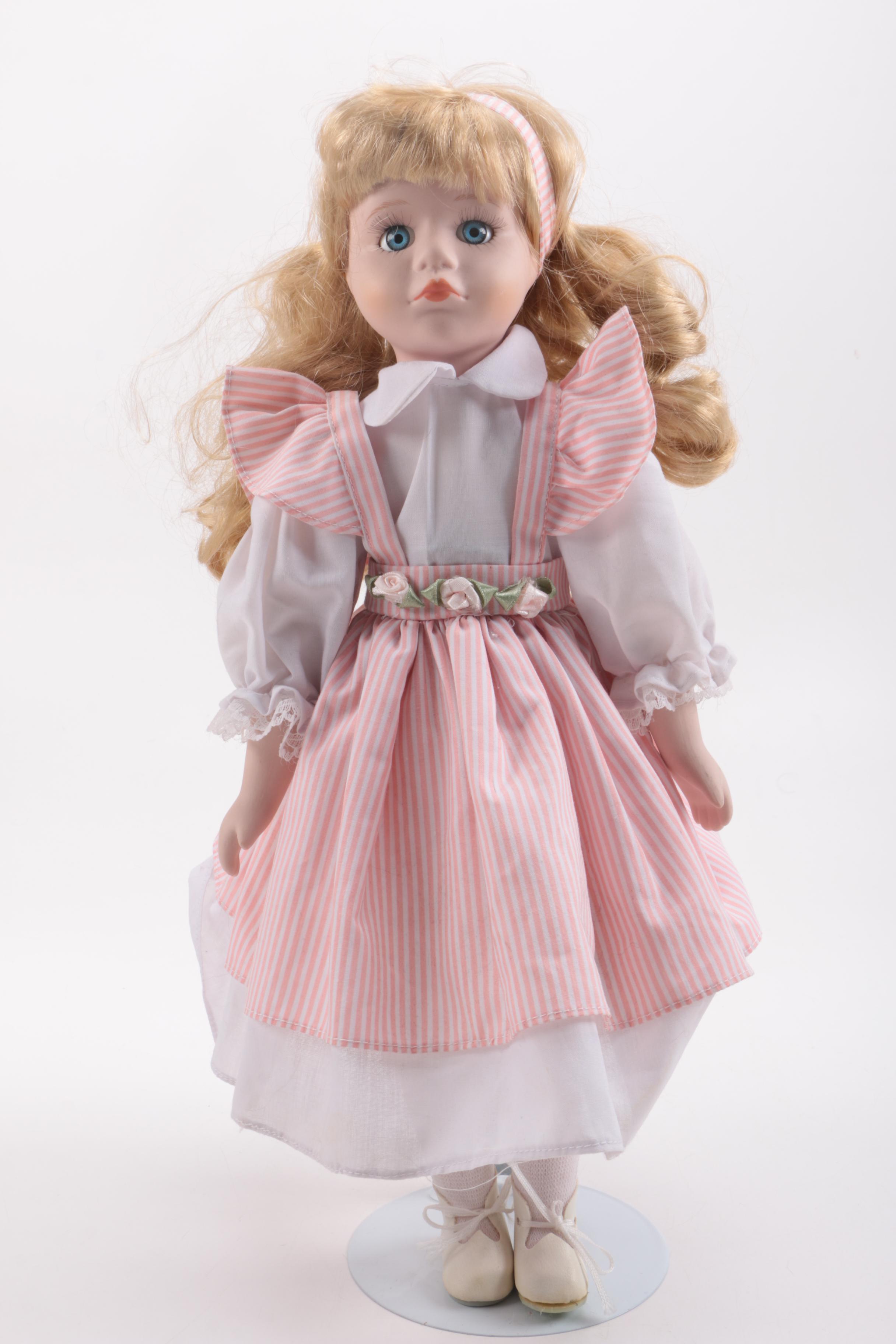 Blue and Pink Dressed Porcelain Dolls