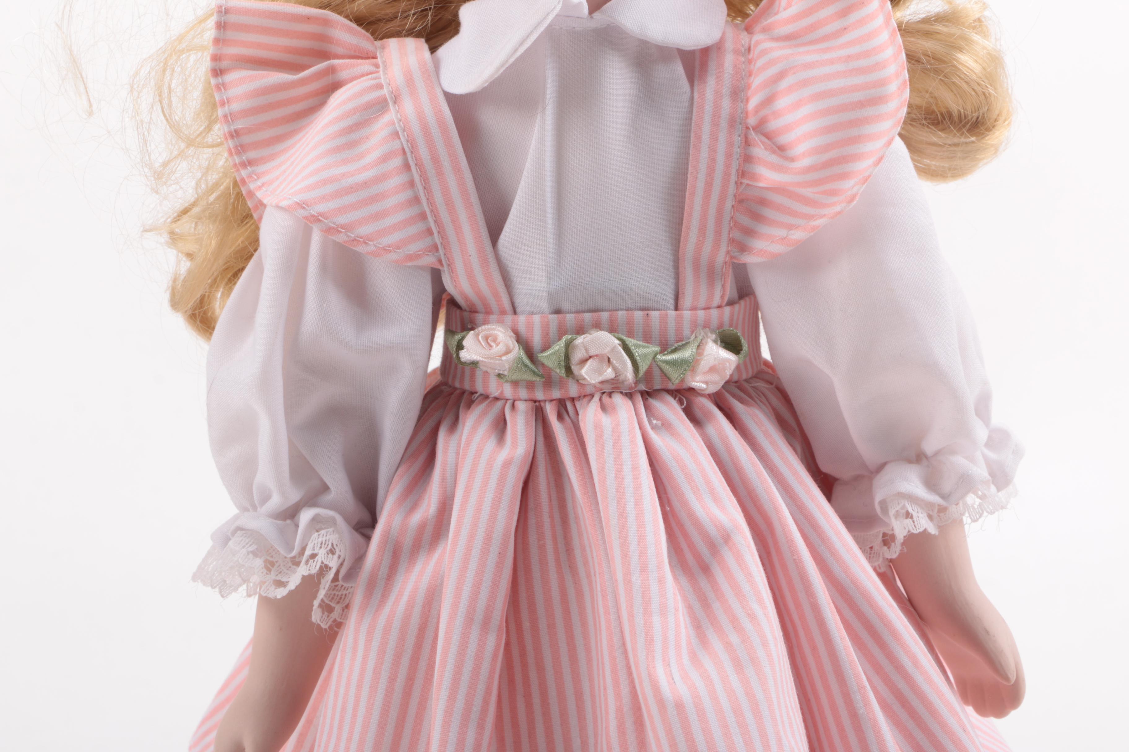 Blue and Pink Dressed Porcelain Dolls